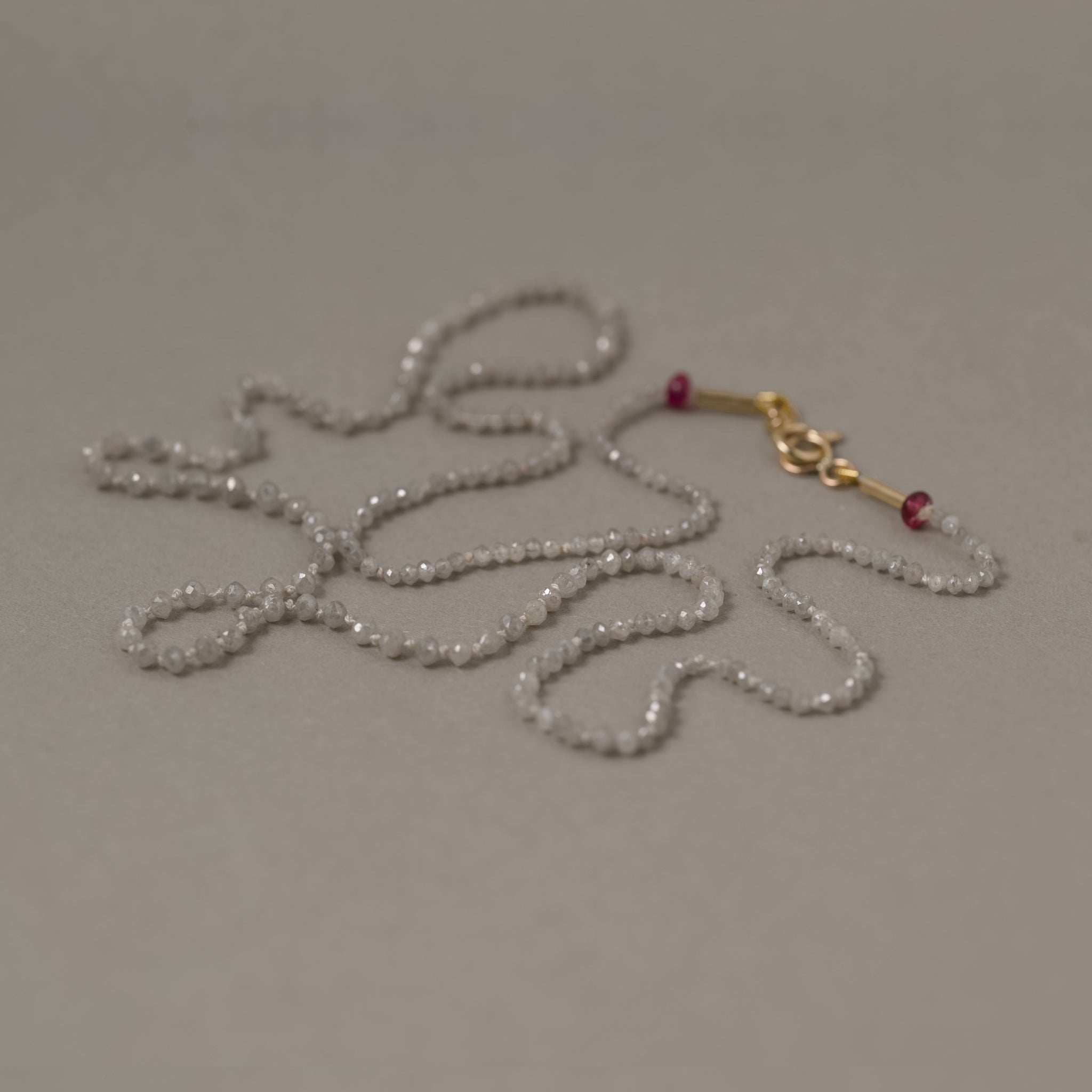 diamond bead necklace clasp detail with ruby accents solid gold Vermilion Brisban