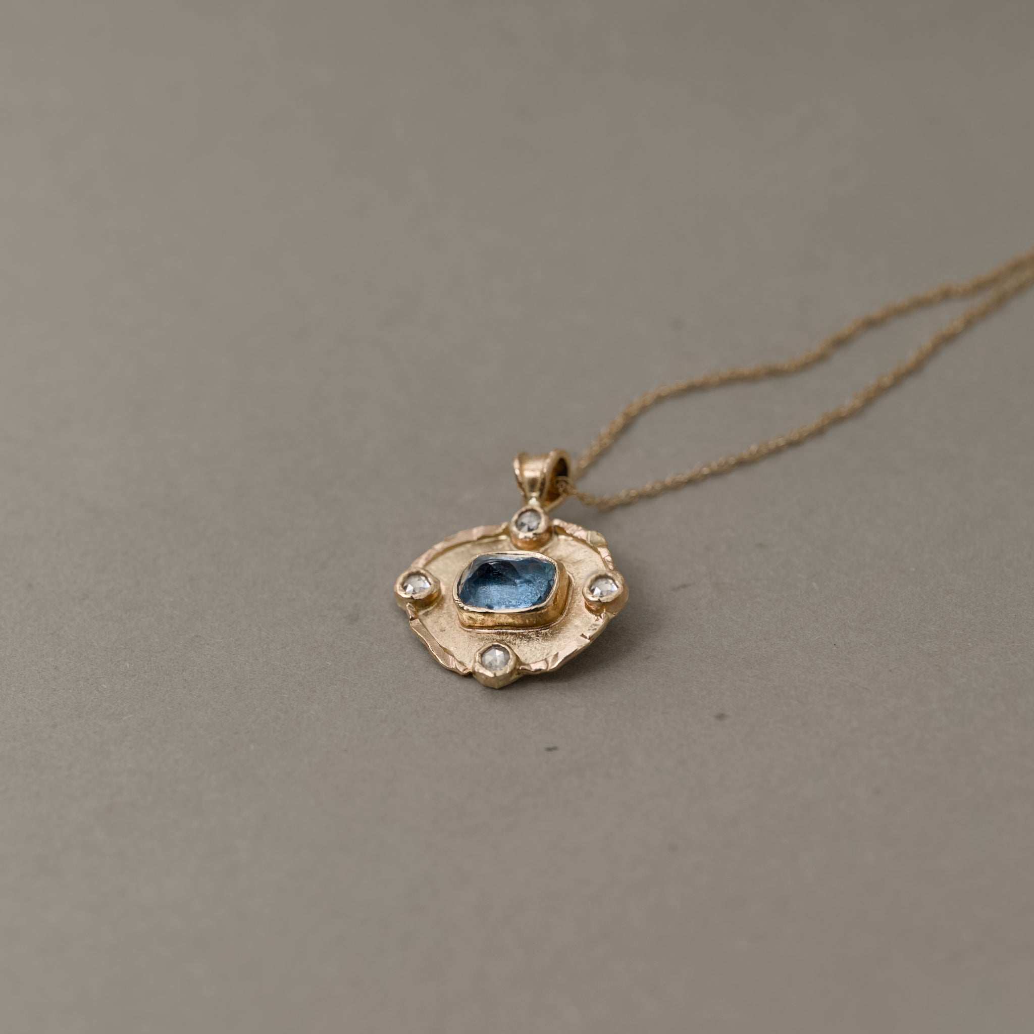 Florin aquamarine diamond pendant necklace with rose-cut diamonds and gold medallion