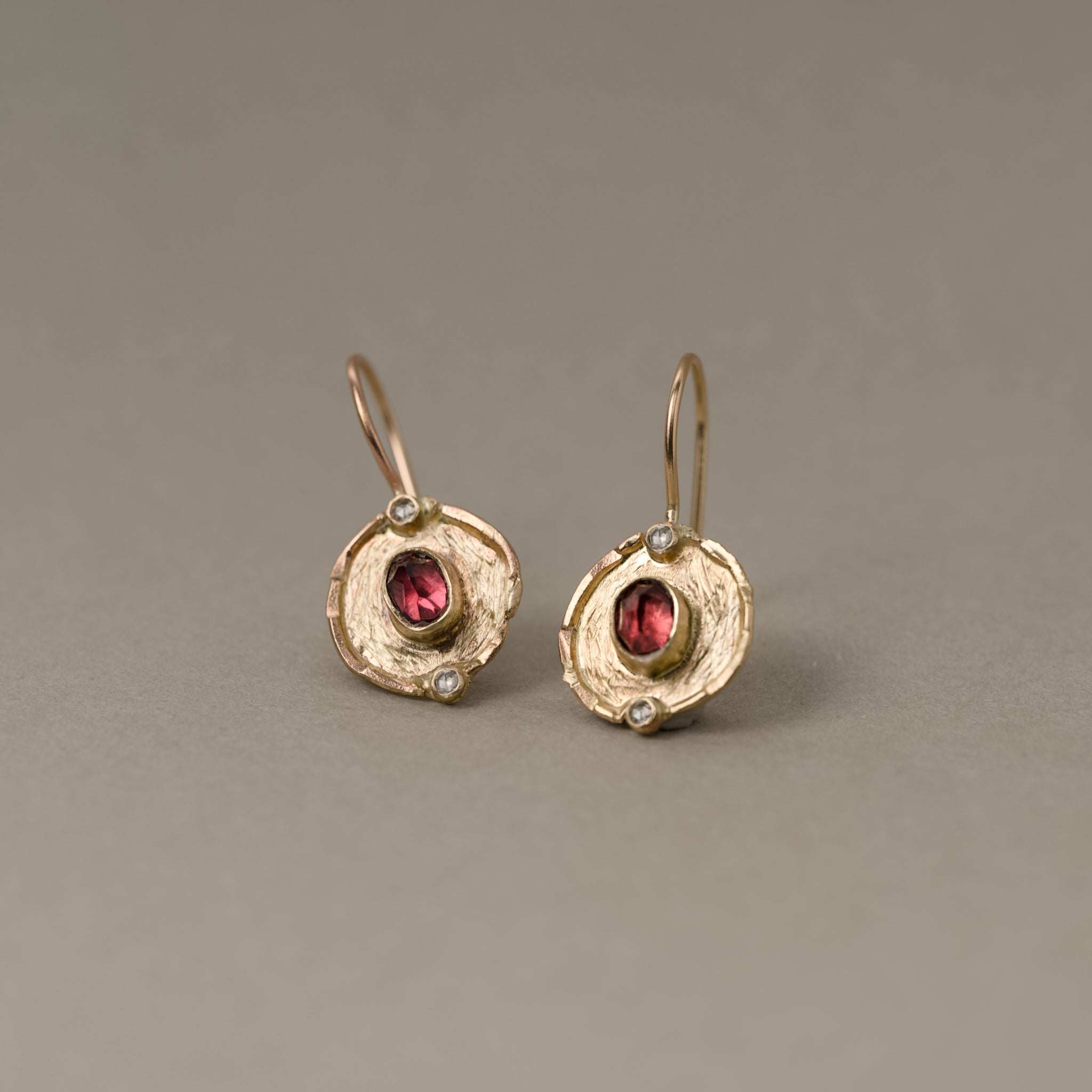 Florin Malaia Garnet Earrings in gold with garnet medallions and diamond accents