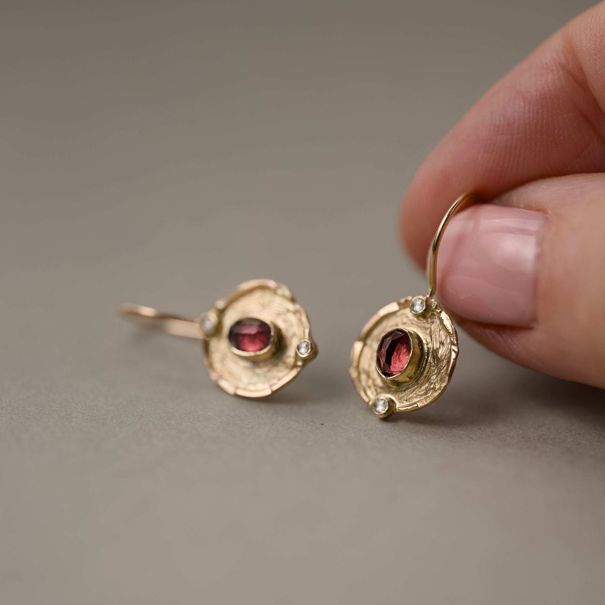 Florin Malaia Garnet Earrings gold medallions with rose diamond accents