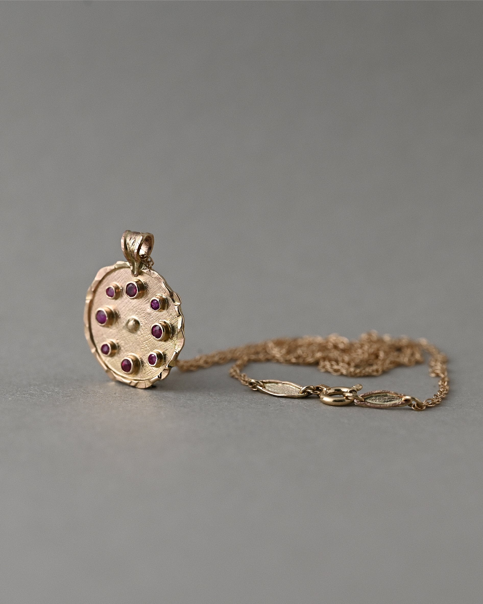 Ruby Florin medallion necklace in 14ct solid gold with Mozambique rubies