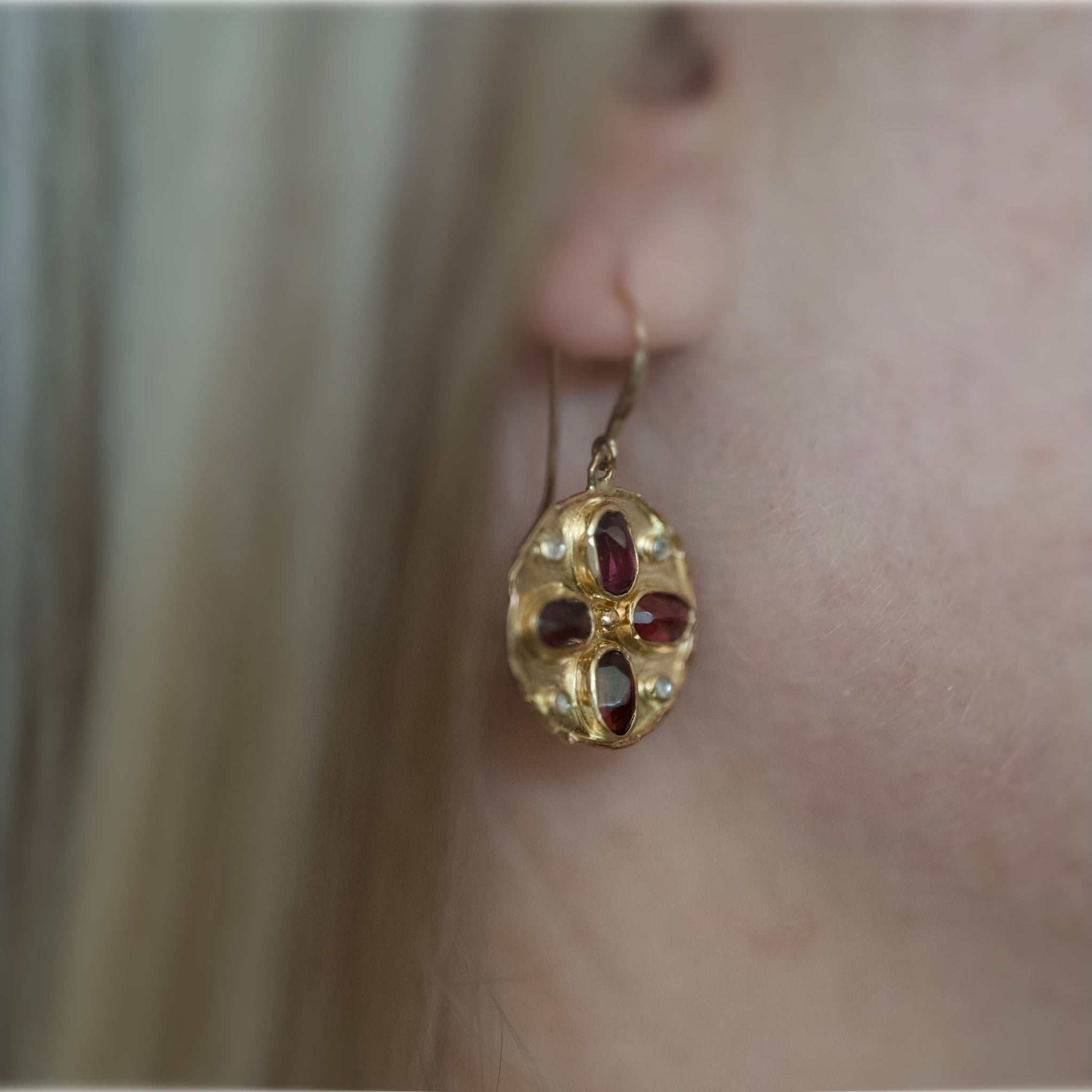 Florin Alta Malaia Garnet Earrings with gold and rose diamond accents showcasing rich crimson garnets