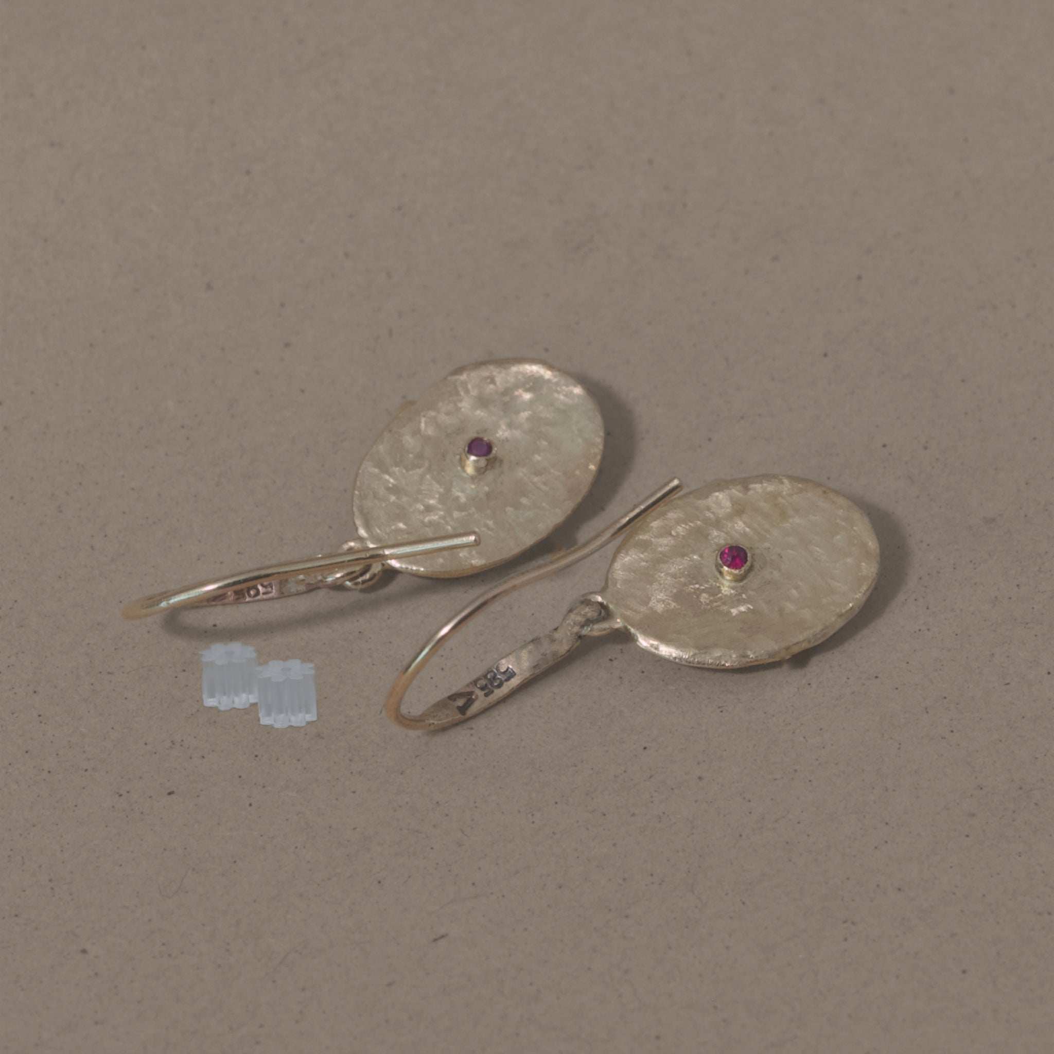Hammered gold coin earrings with small central gemstones, elegant and unique design Emerald Earrings