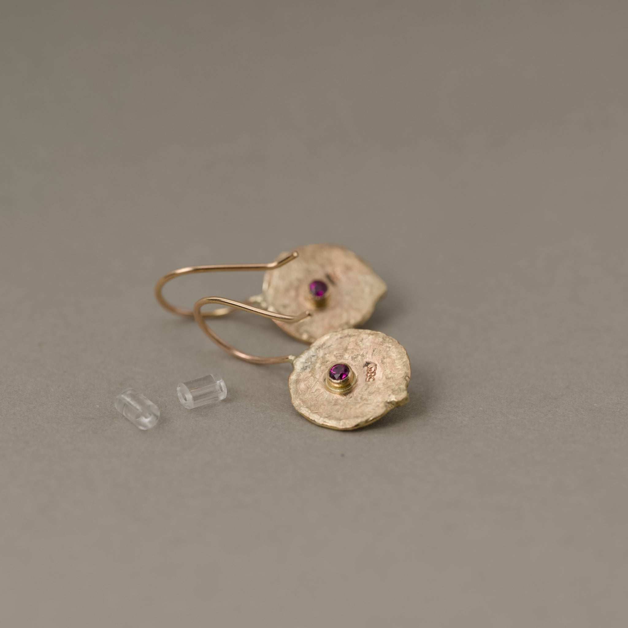 Florin Malaia Garnet Earrings with gold and diamond accents, featuring rich garnet medallions