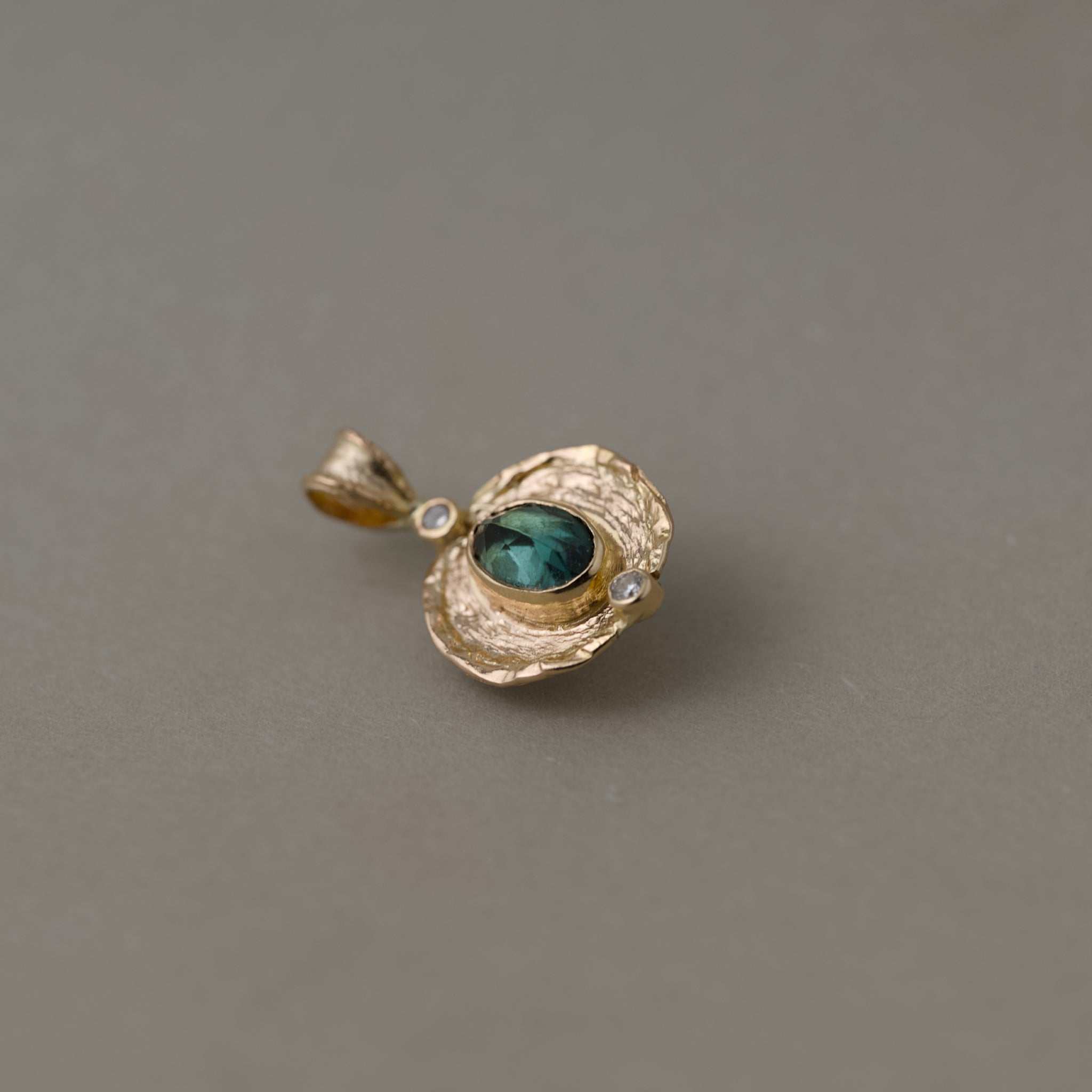 Florin Indicolite Tourmaline necklace with brushed gold medallion and diamond frame