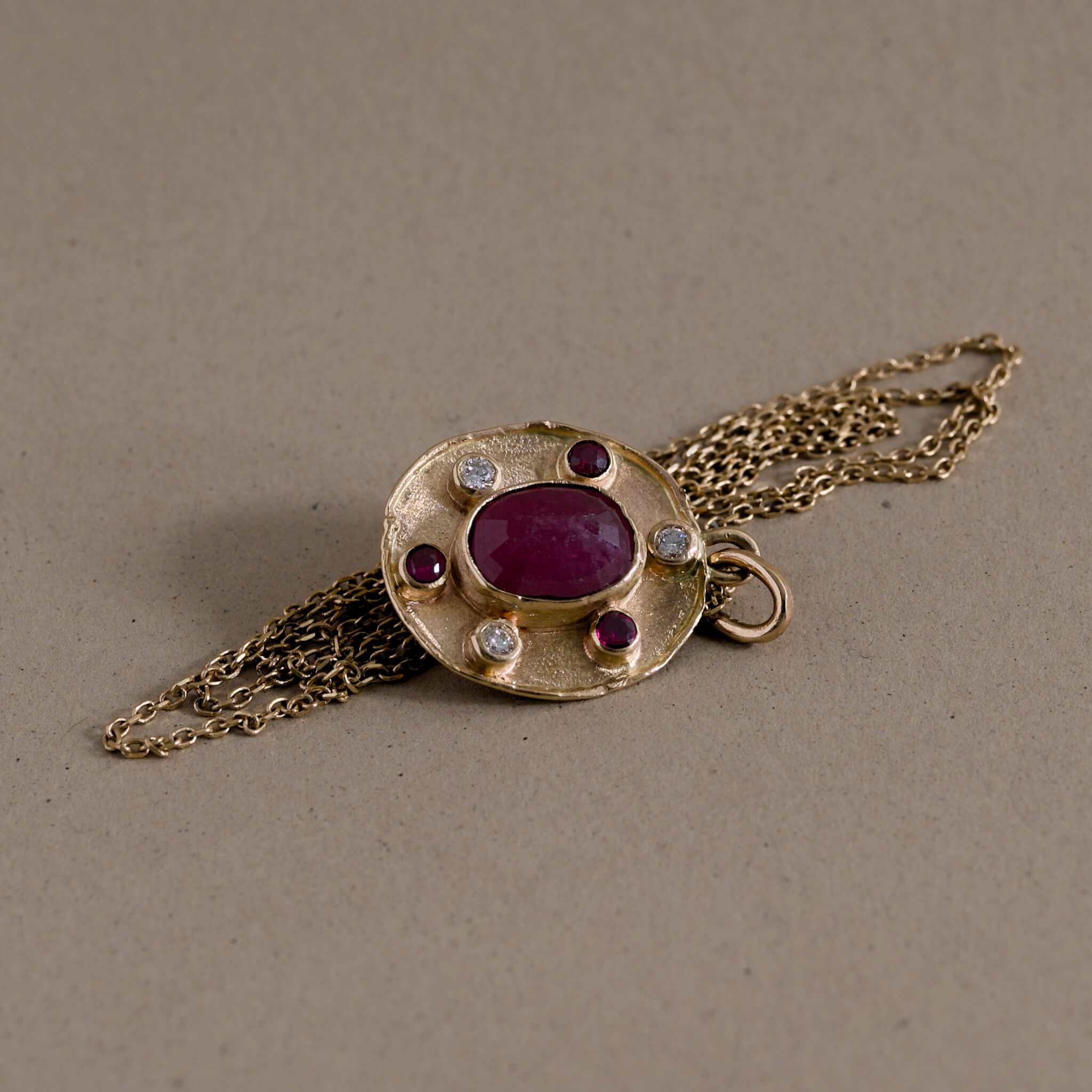 Florin Ruby Necklace in 14ct gold with diamonds and Mozambique rubies.