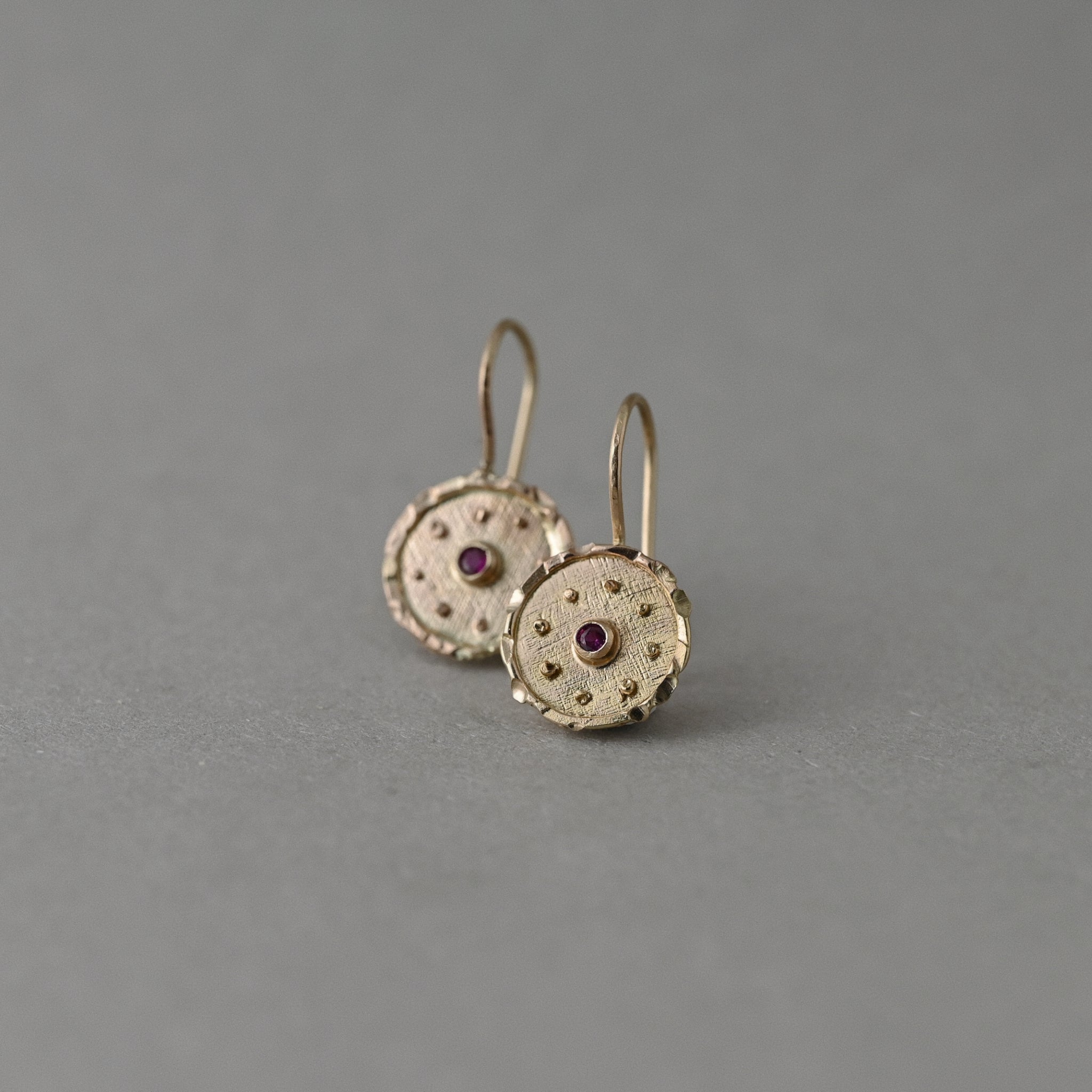 Florin 14ct solid gold discs with Mozambique rubies.