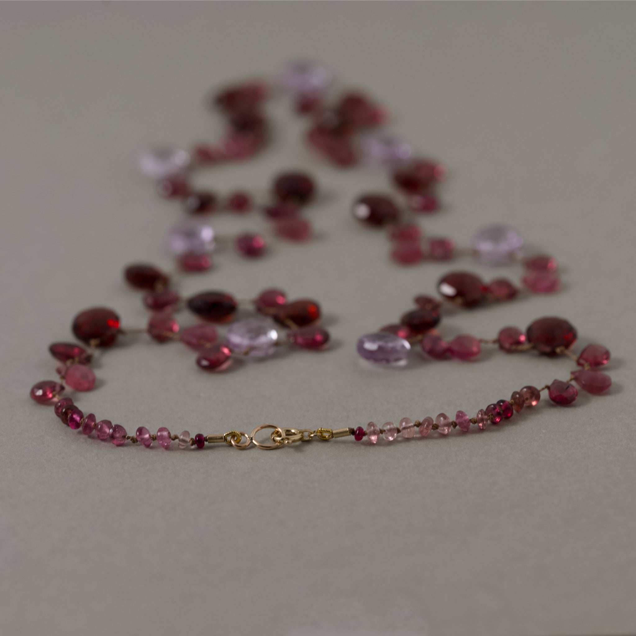 Lido Garnet Tourmaline Amethyst gemstone necklace with gold clasp and silk string