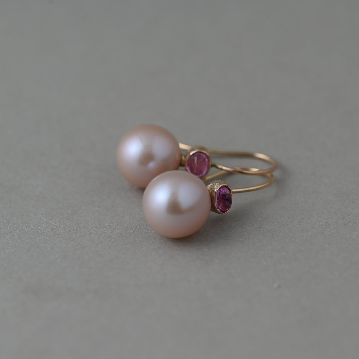 Pink sapphire and Edison pink pearl earrings in solid 14ct gold