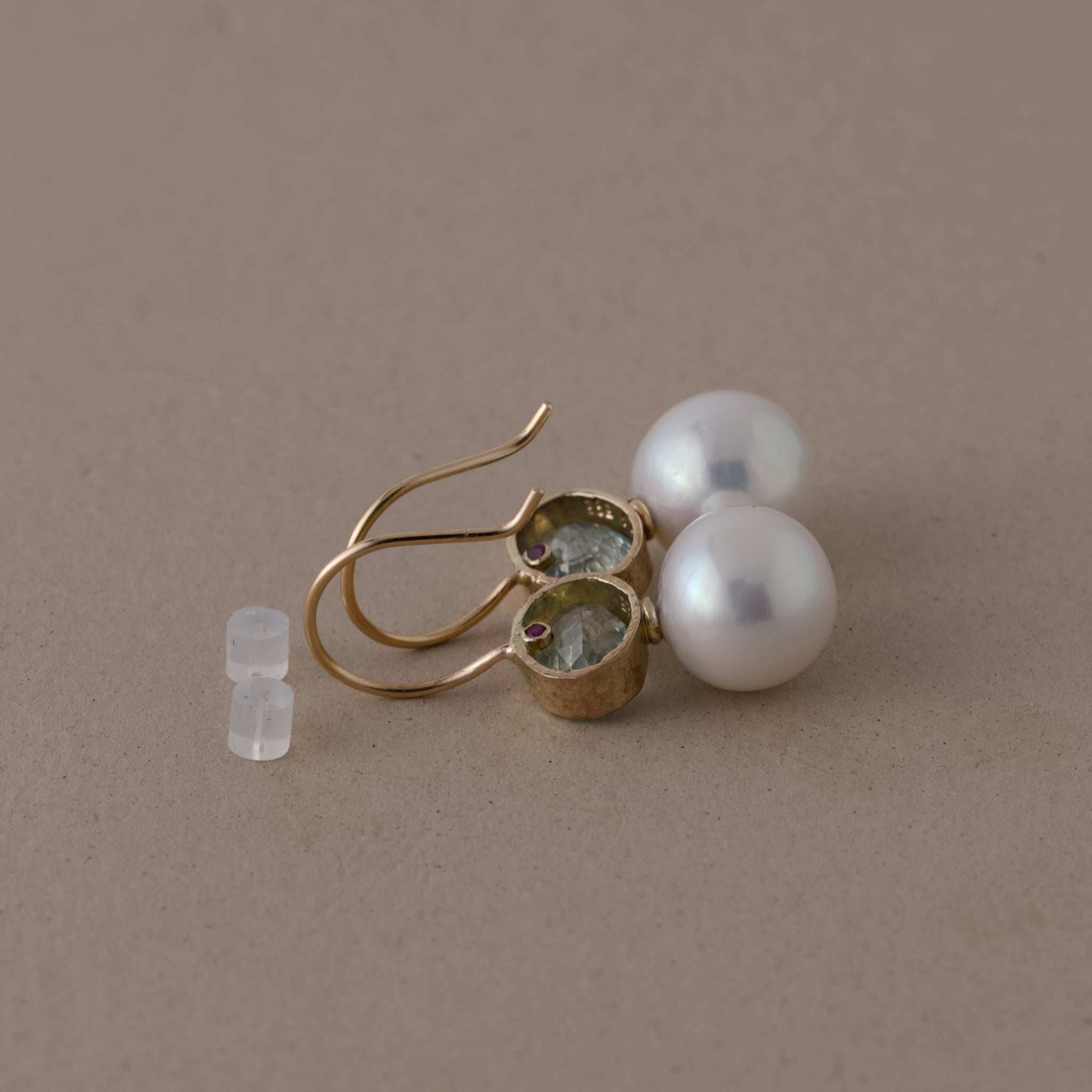 14ct gold pearl earrings with green Paraíba tourmaline stones, artisan-made design