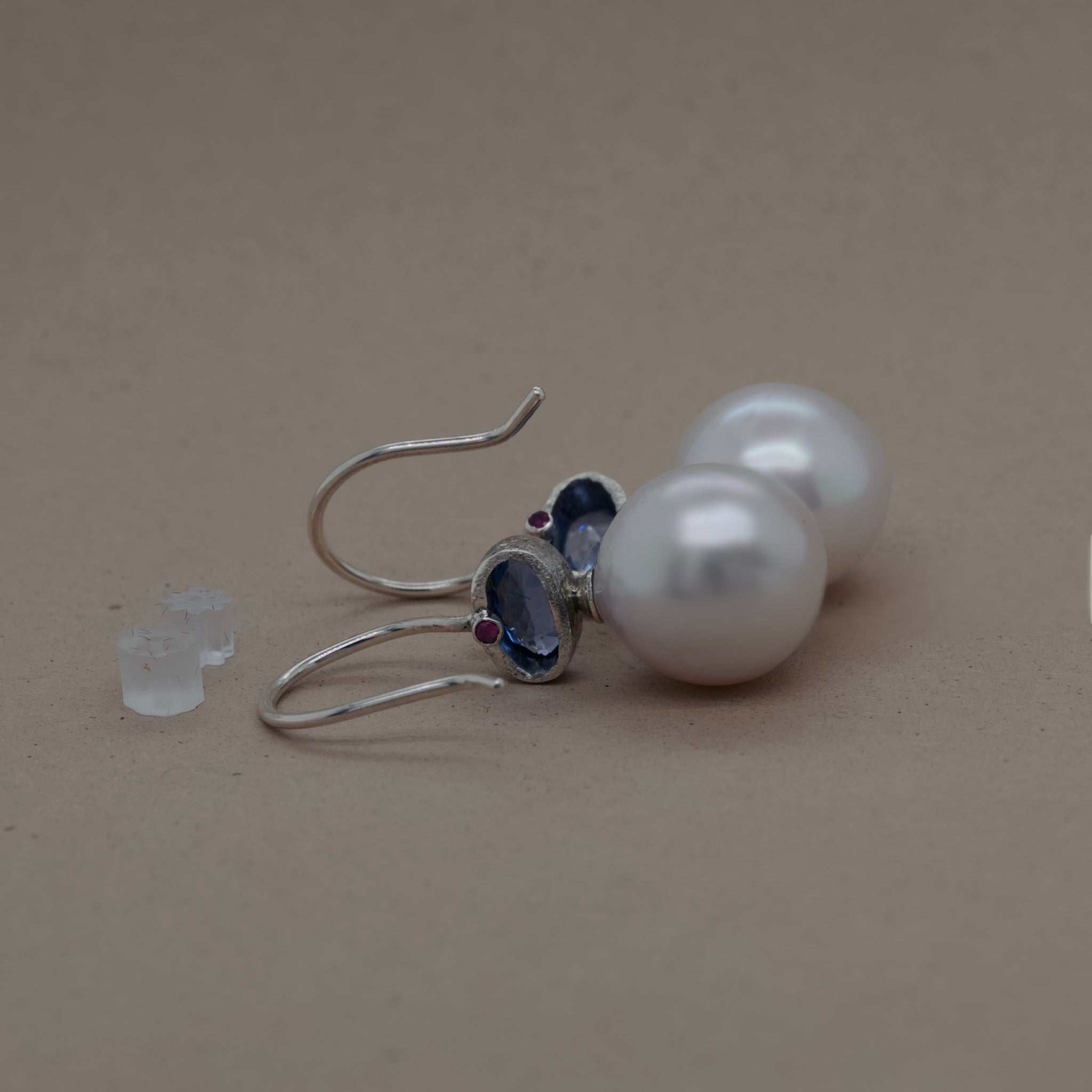 Silver blue sapphire pearl earrings with Ceylon sapphire and milk-hued pearls set in lunar silver.