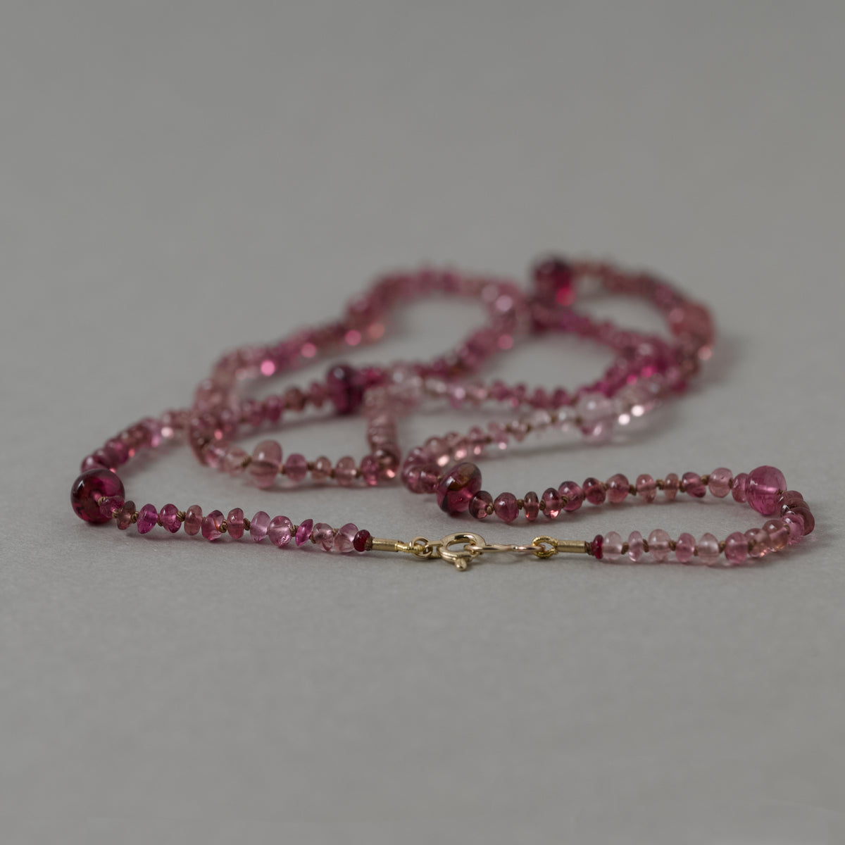 Filo Pink Tourmaline Necklace with rose tourmalines on pure silk with 14ct gold clasp