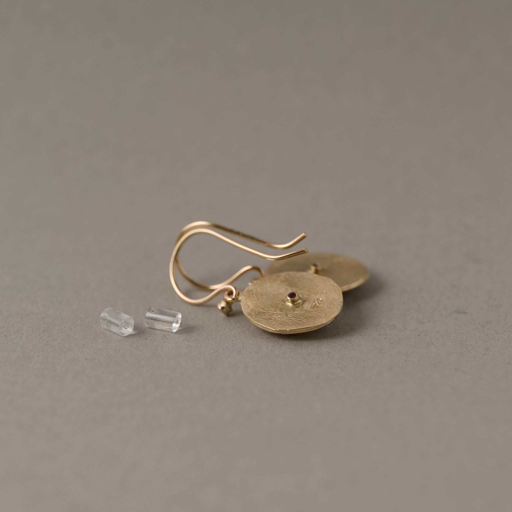 Rainbow sapphire earrings with diamonds on 14ct gold Florin discs.