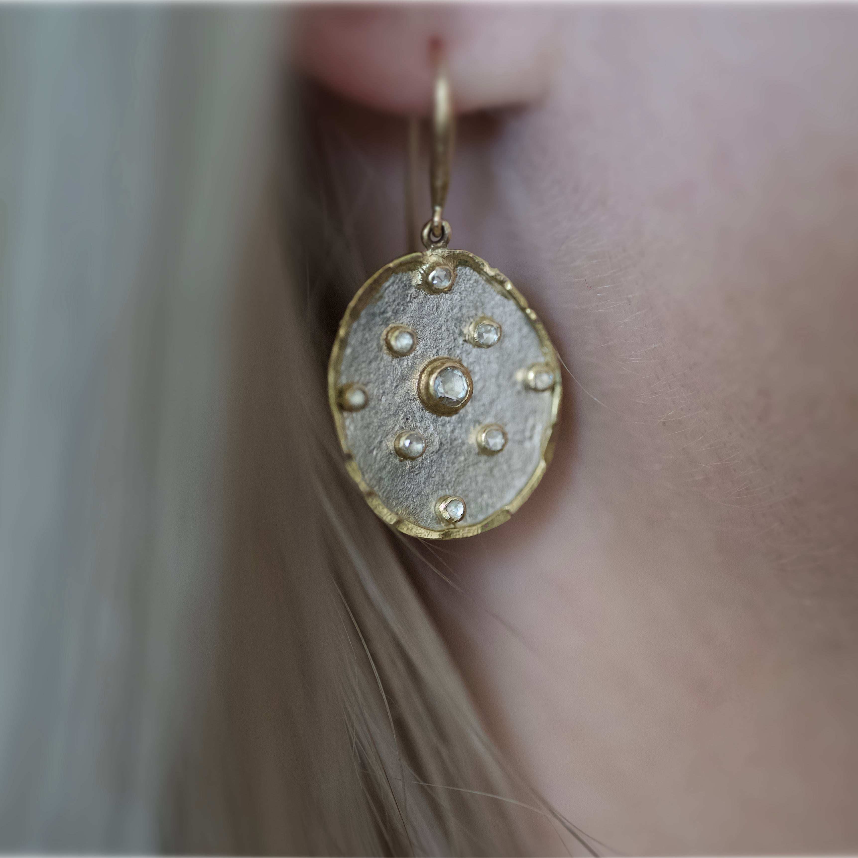 florin alta platinum diamond earrings worn in ear