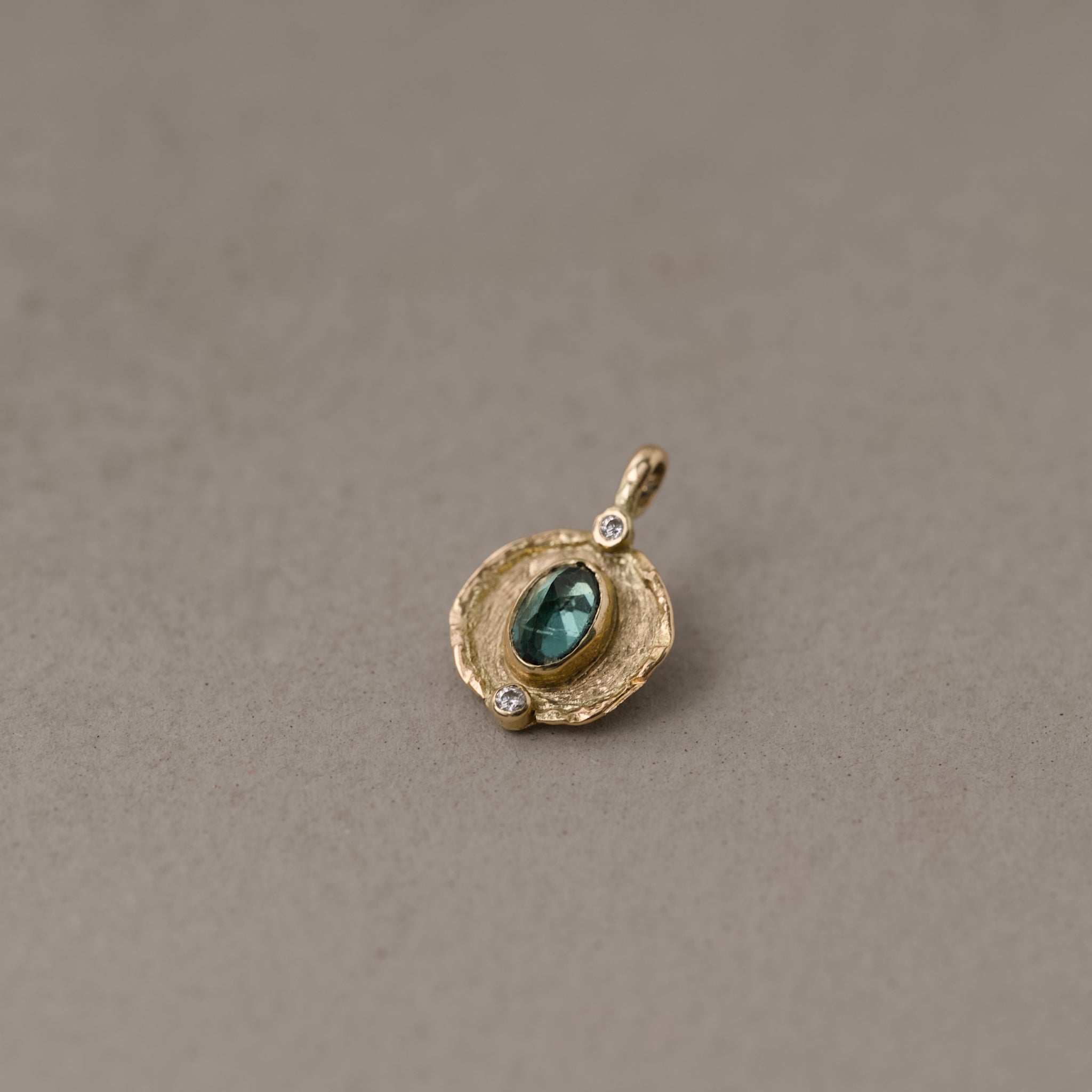 indicolite tourmaline and diamond pendant handmade in 14ct gold
