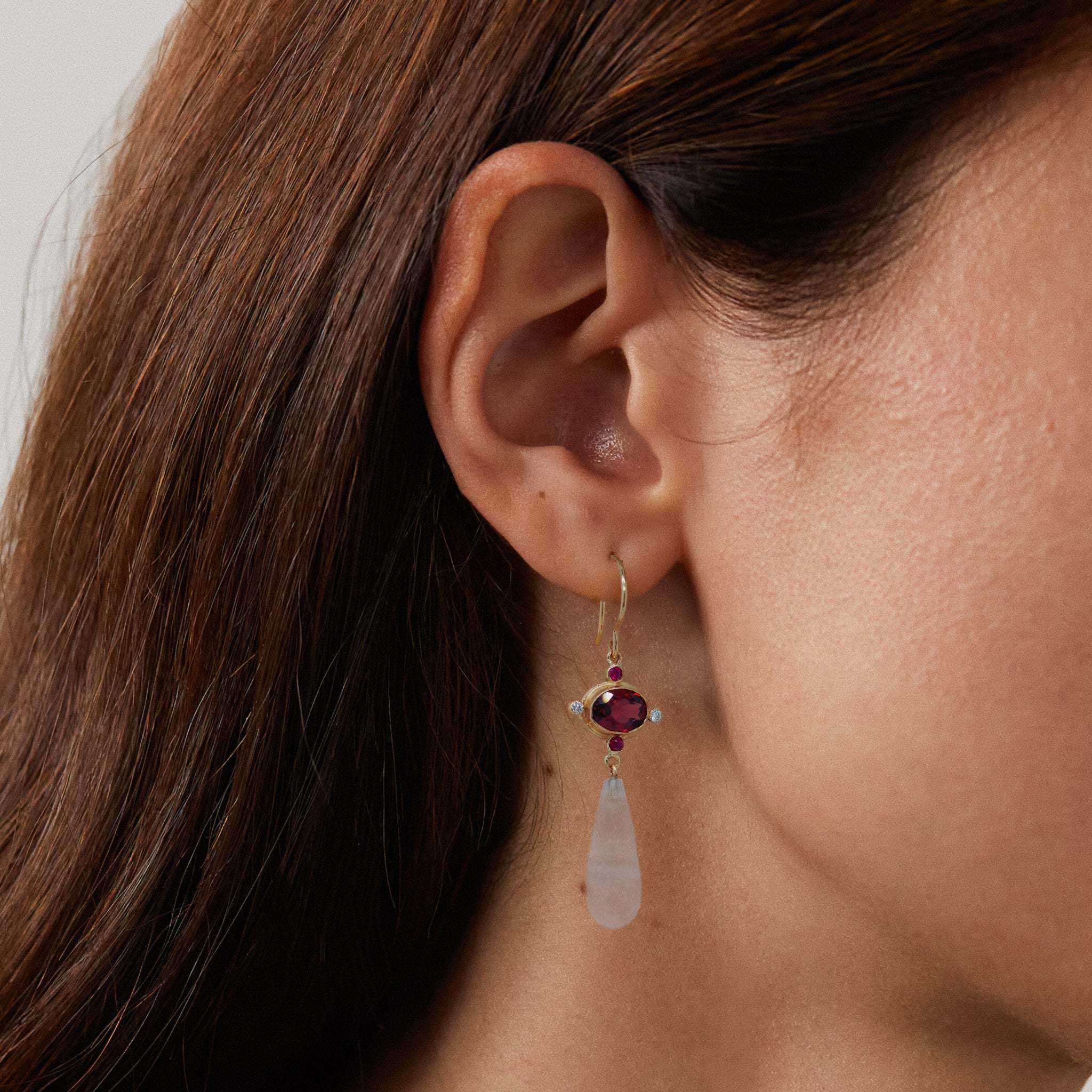 Elegant Sera Garnet Earrings with rose quartz, rubies, diamonds, and gold detail.