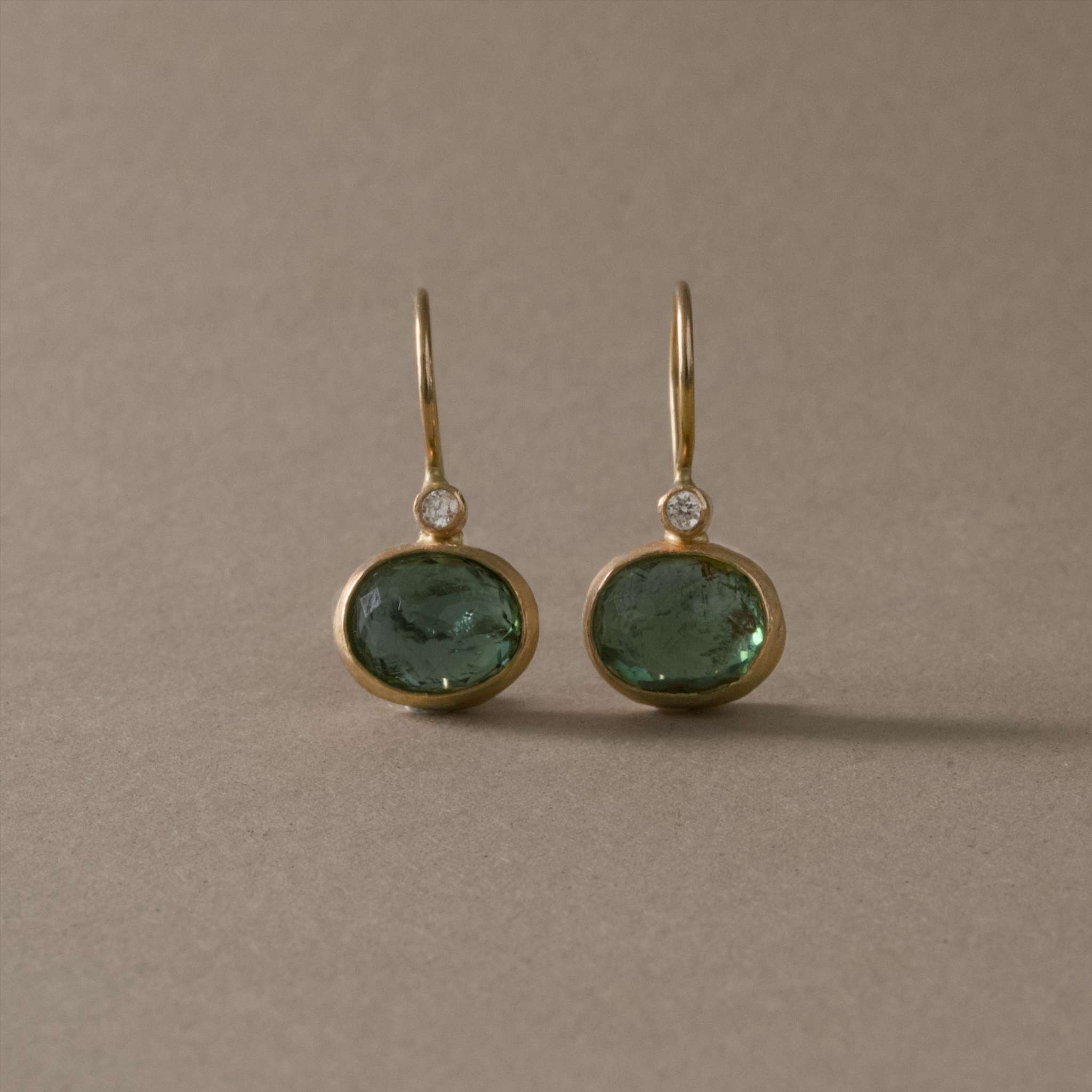 Pero diamond and leaf green Paraiba tourmaline earrings in 14ct gold with natural diamonds