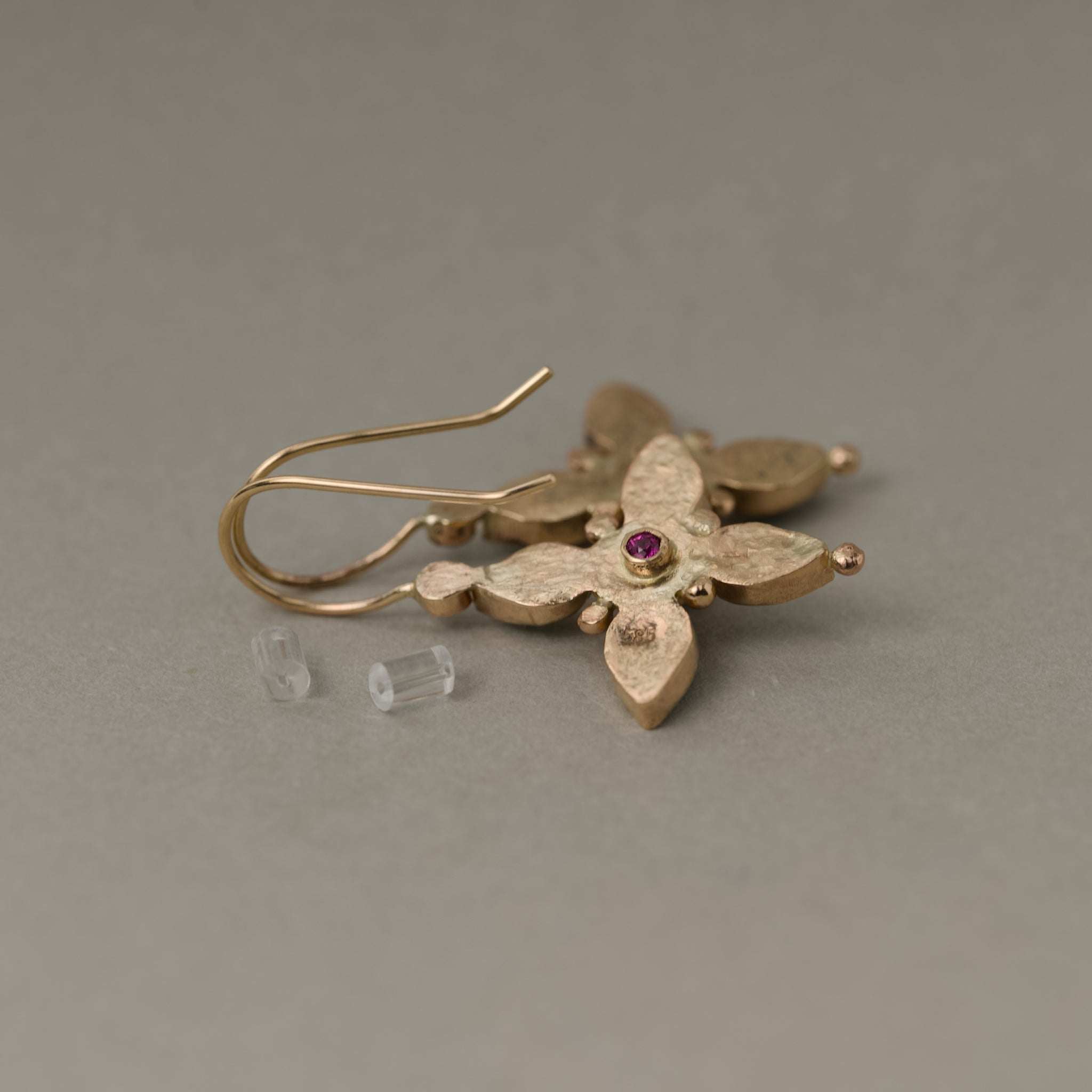 Quattro Tsavorite garnet diamond earrings in gold with green tsavorite and rose garnet gemstones