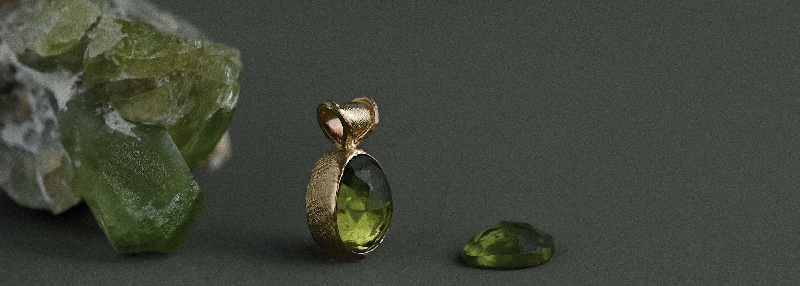 14ct gold Arizona peridot pendant necklace with natural rough peridot crystal and faceted peridot gemstone, made in Australia.