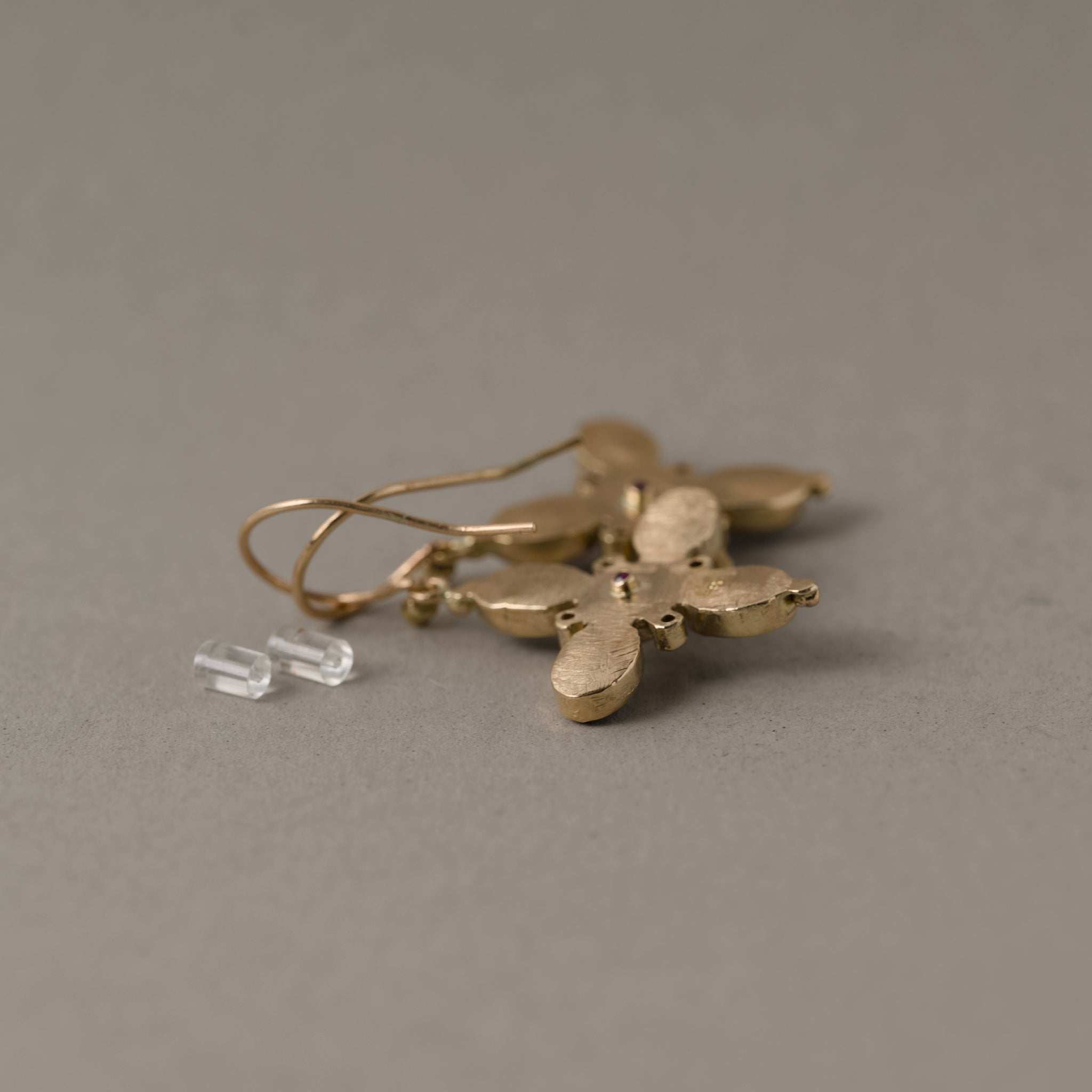Quattro Topaz Aquamarine Earrings in gold with blue topaz, aquamarine, and pink sapphire gemstones