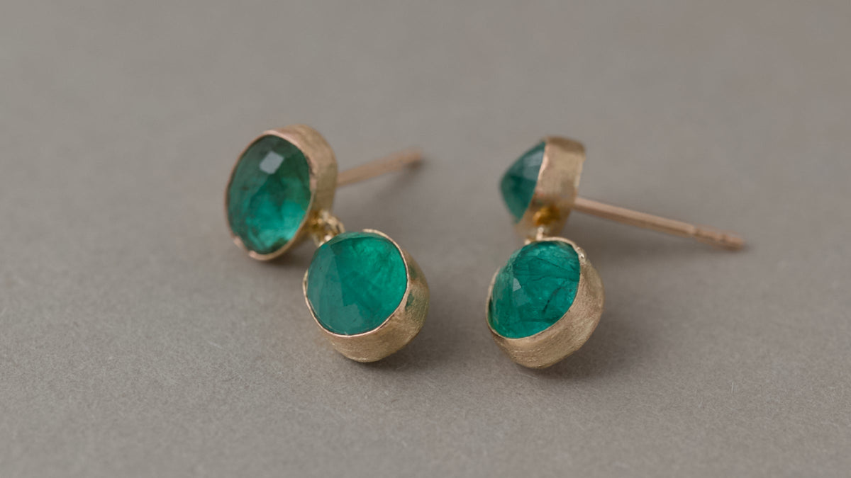 Natural emerald jewellery in 14ct gold by Vermilion Jewellery, featuring rich green emerald gemstones