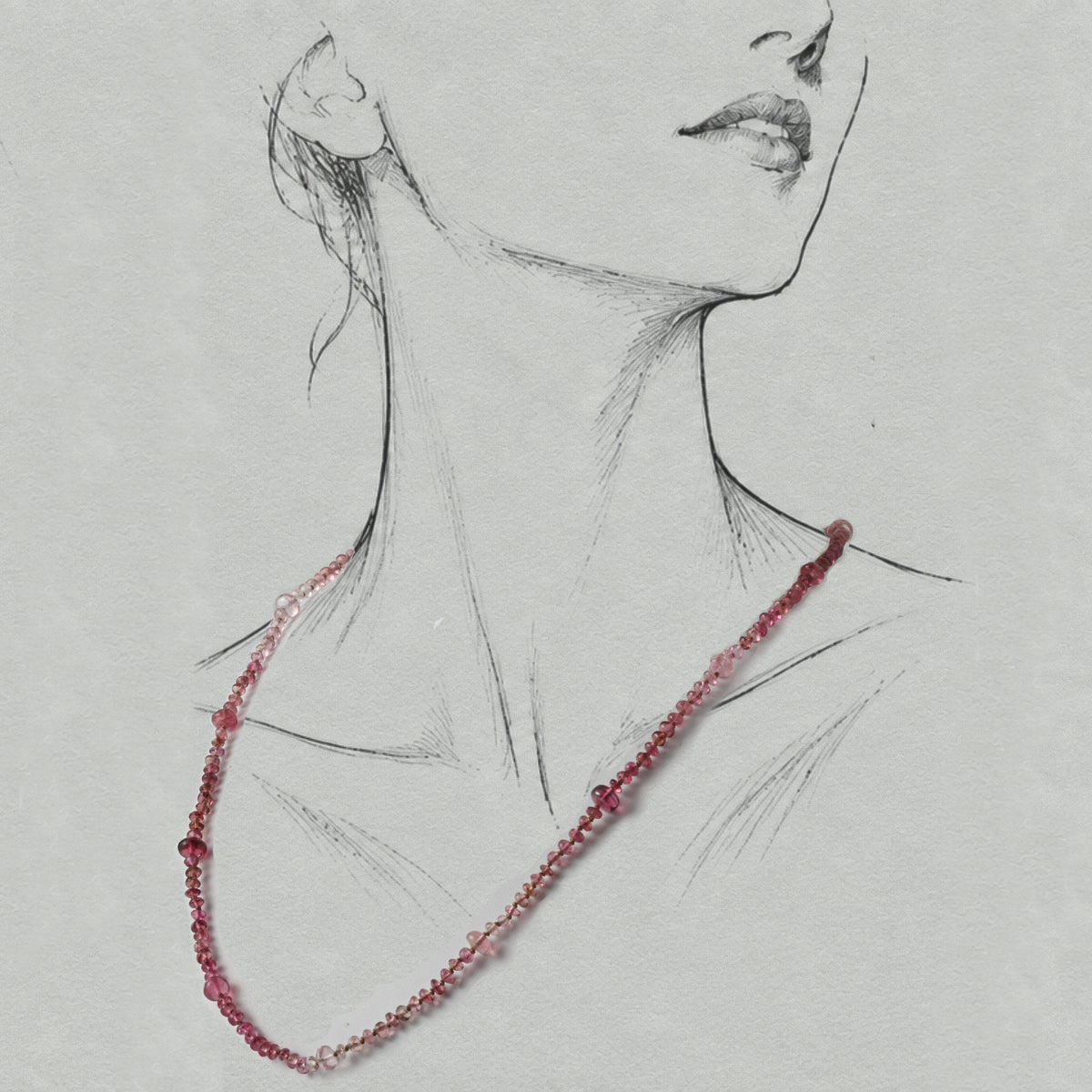 Filo  tourmaline silk-strung necklace worn on a graphite illustrated figure.