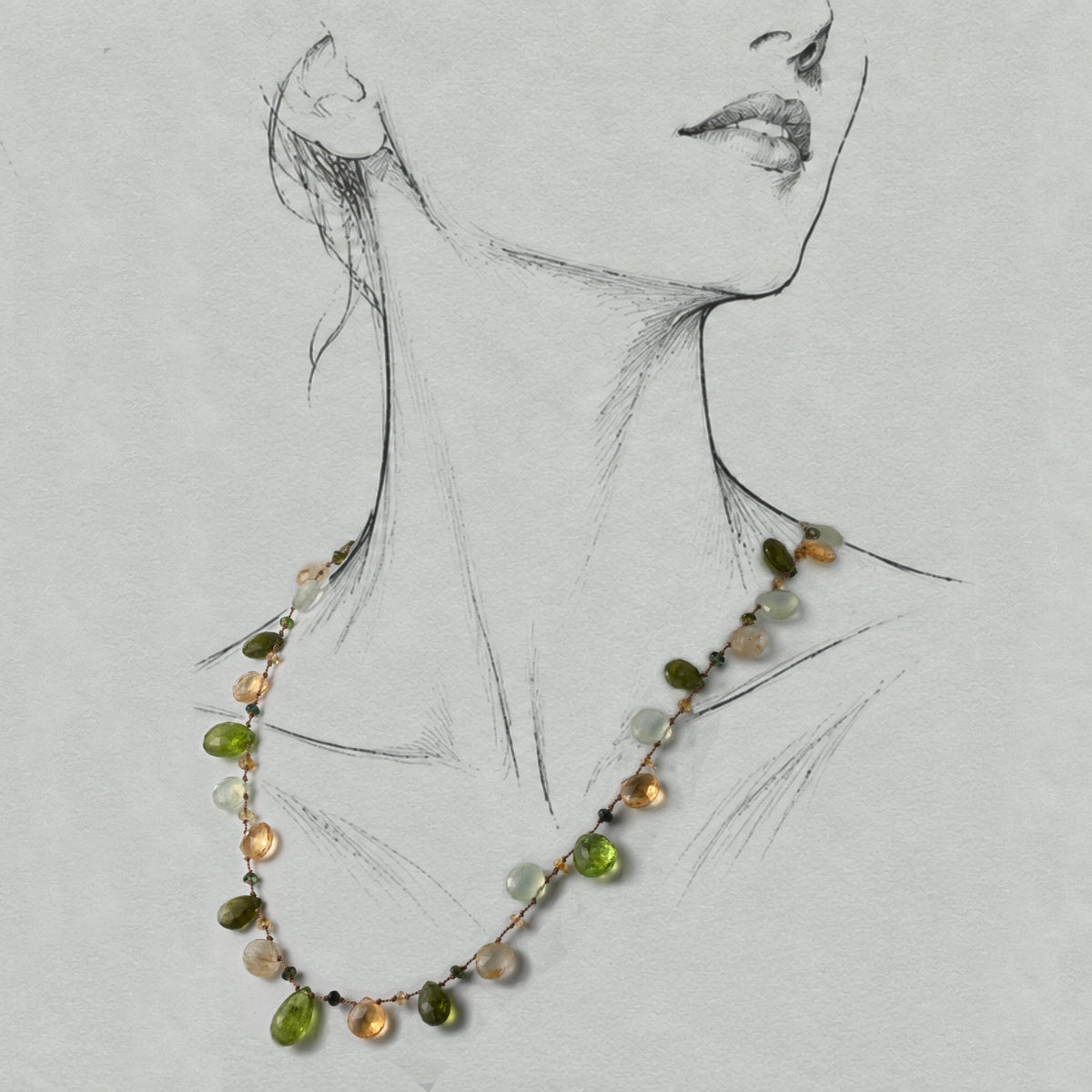 Lido peridot citrine necklace shown on drawing model 