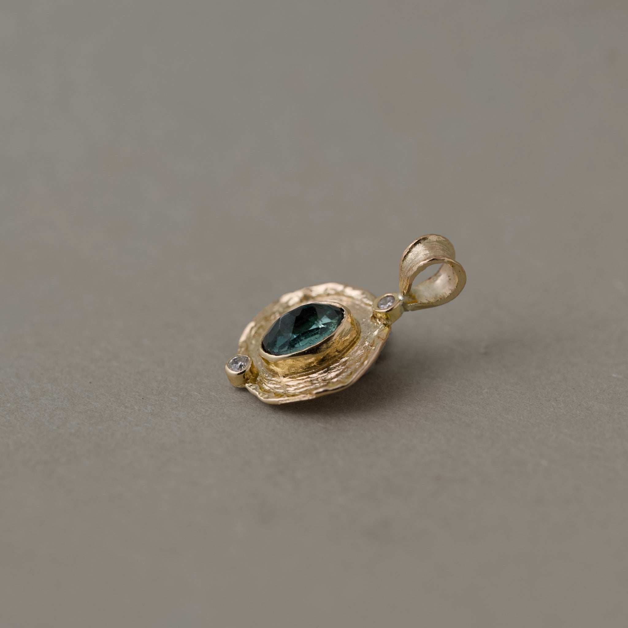 Florin Indicolite Tourmaline necklace with brushed gold medallion and diamond frame