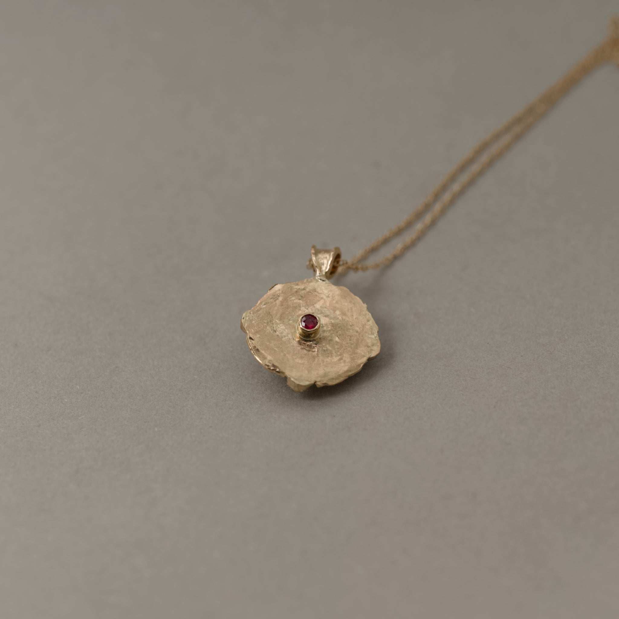 Back of Aquamarine and diamond Florin pendant in solid gold by Vermilion Jewellery Brisbane.