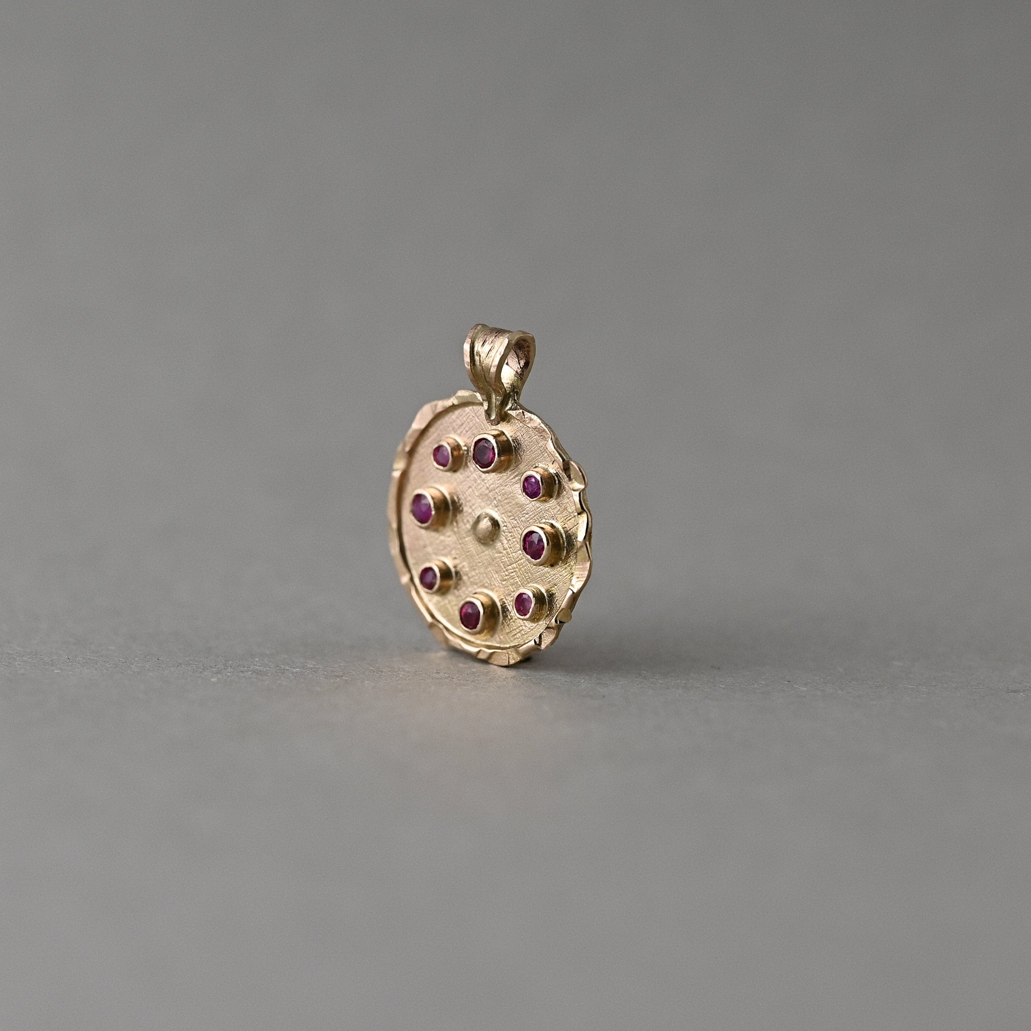 Florin Mozambique ruby medallion in 14ct solid gold