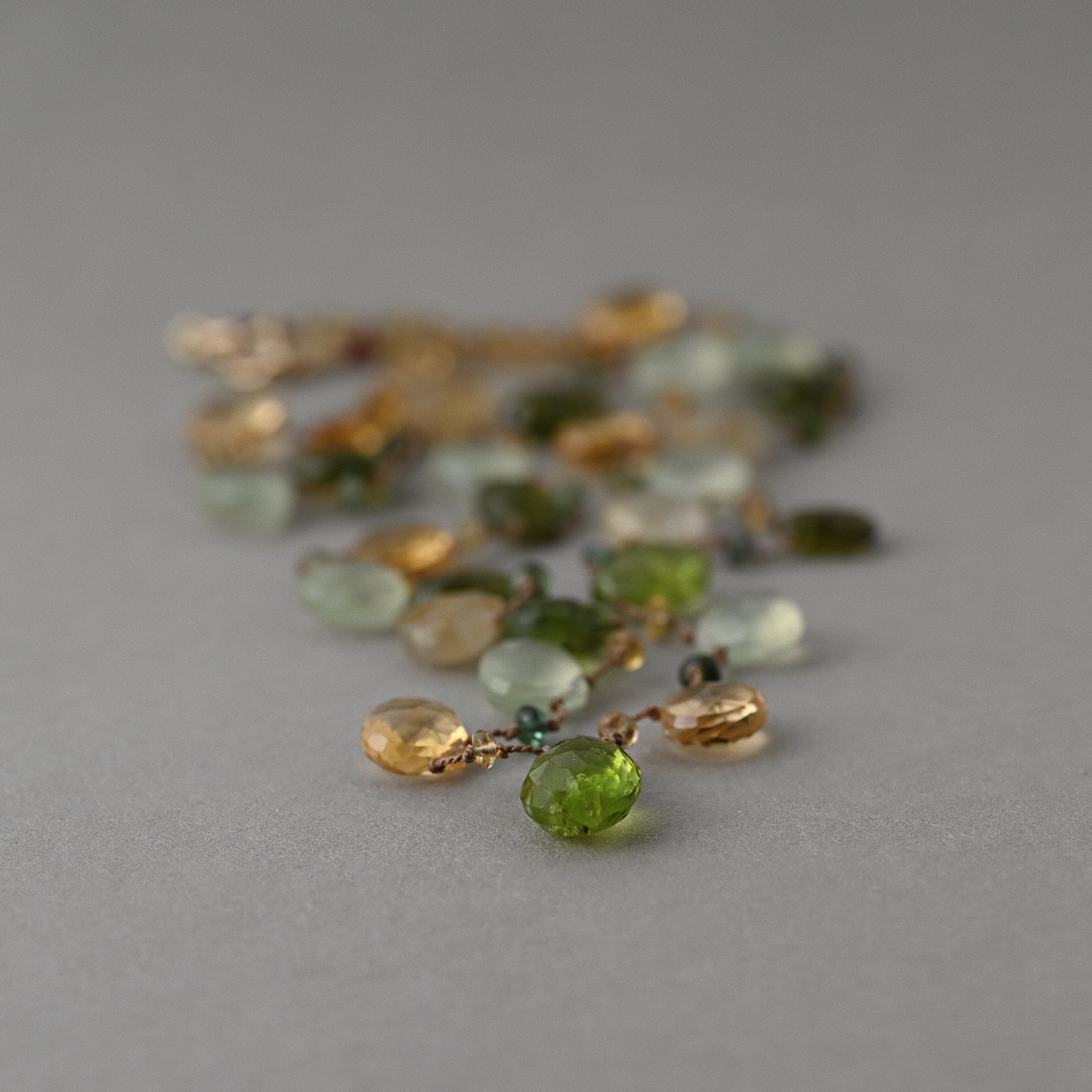 lido Peridot citrine gemstone necklace strung on silk with a 14ct gold clasp