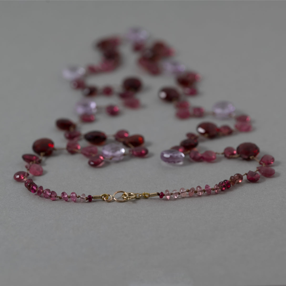 Lido Garnet Tourmaline Amethyst gemstone necklace with gold clasp and silk string
