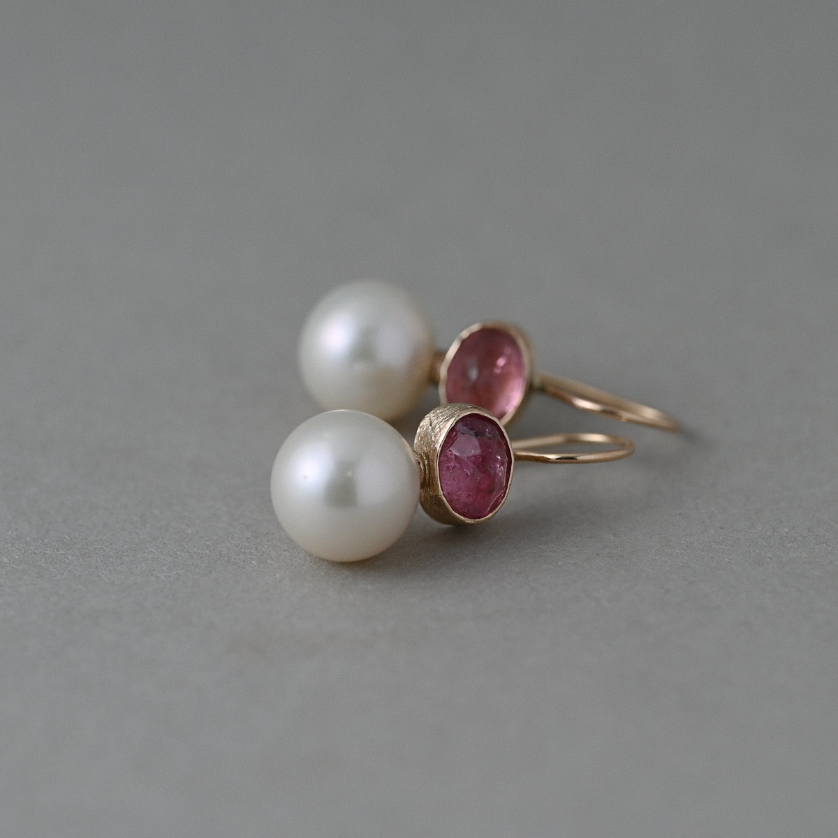 pink tourmaline and Edison pearl drop earrings set in solid 14ct gold
