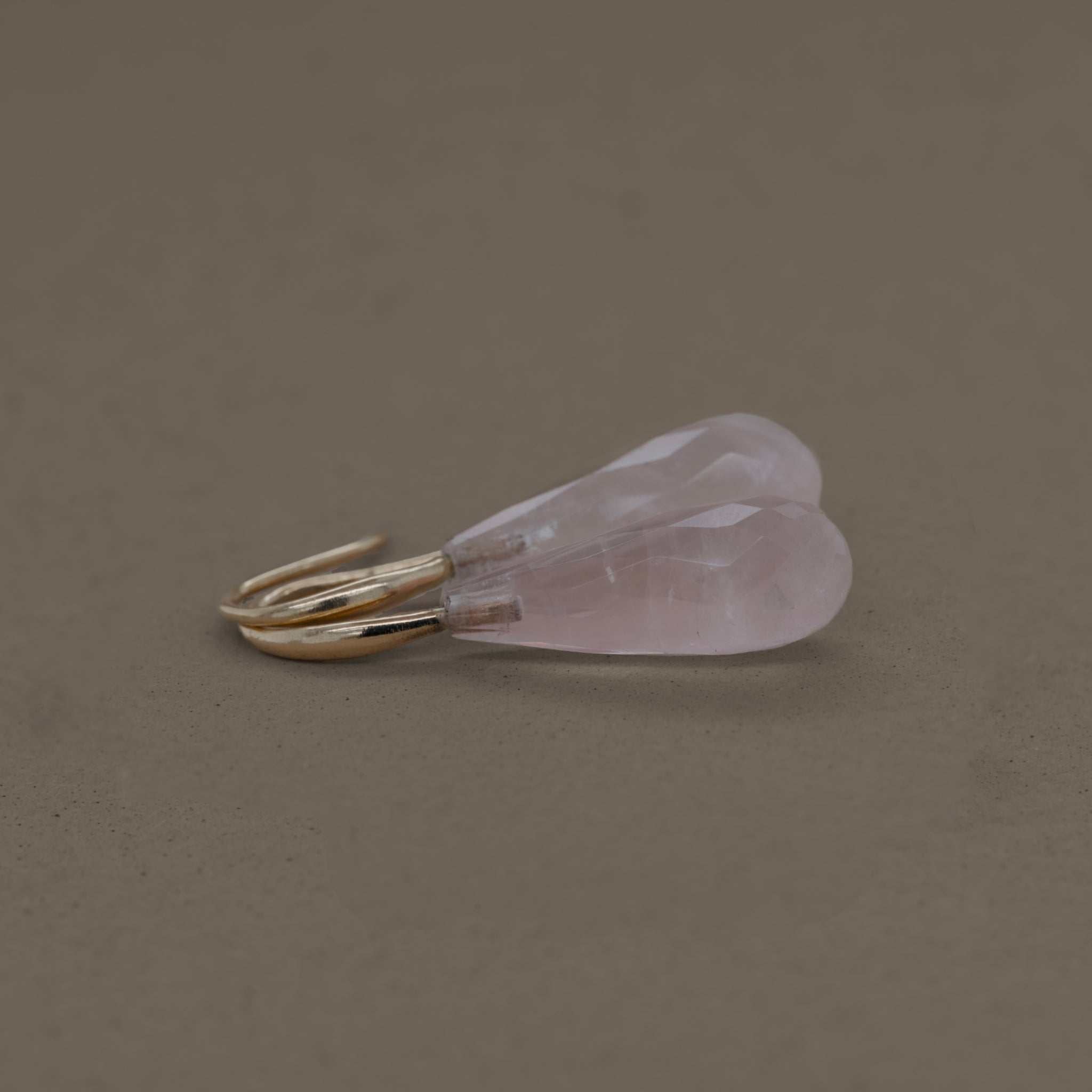 Rose Quartz drop earrings with gold hooks.