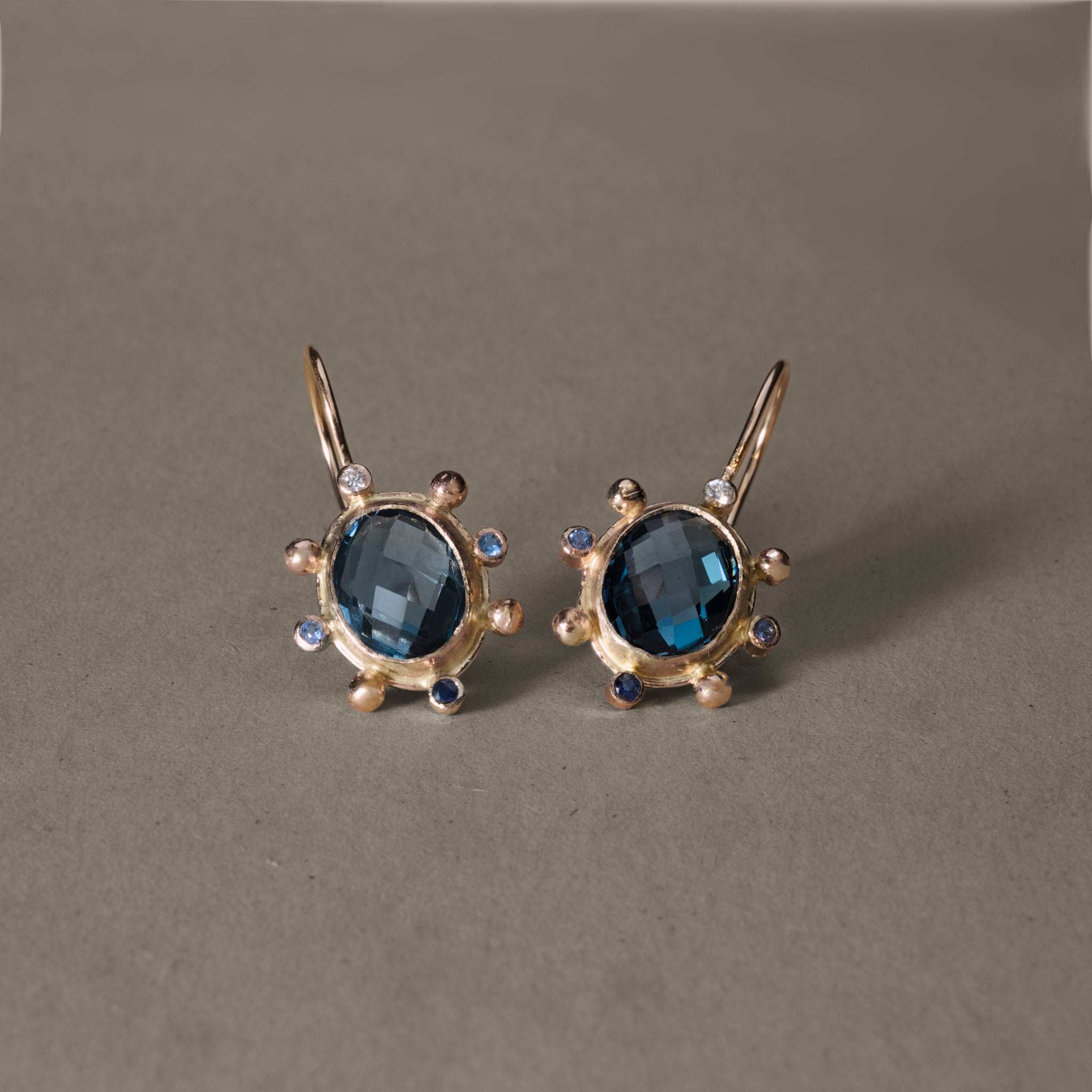 Blue Topaz Earrings with Sapphires and Diamonds in Gold.