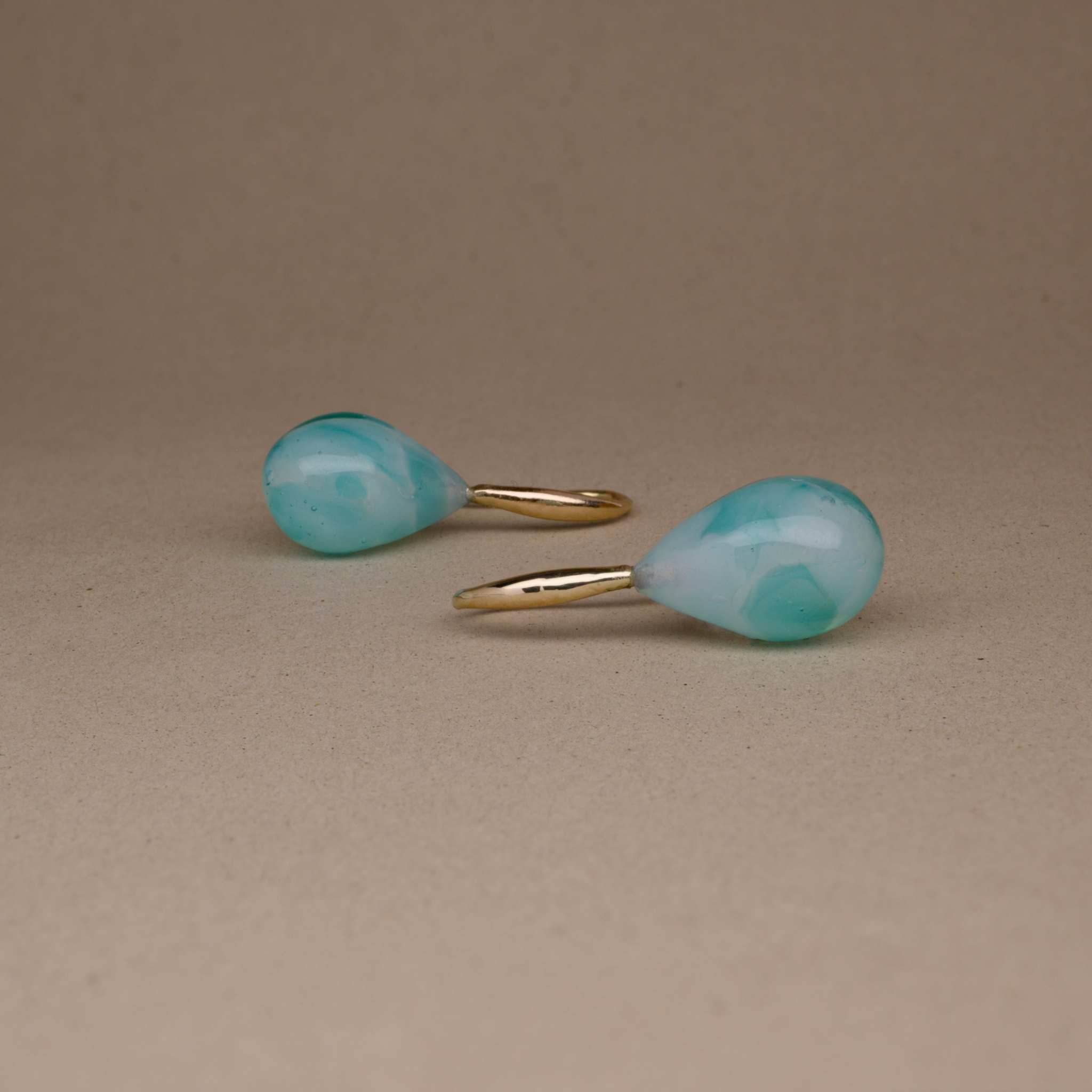 Bella Aquamarine Earrings with vivid blue-green glass and 14ct gold settings.