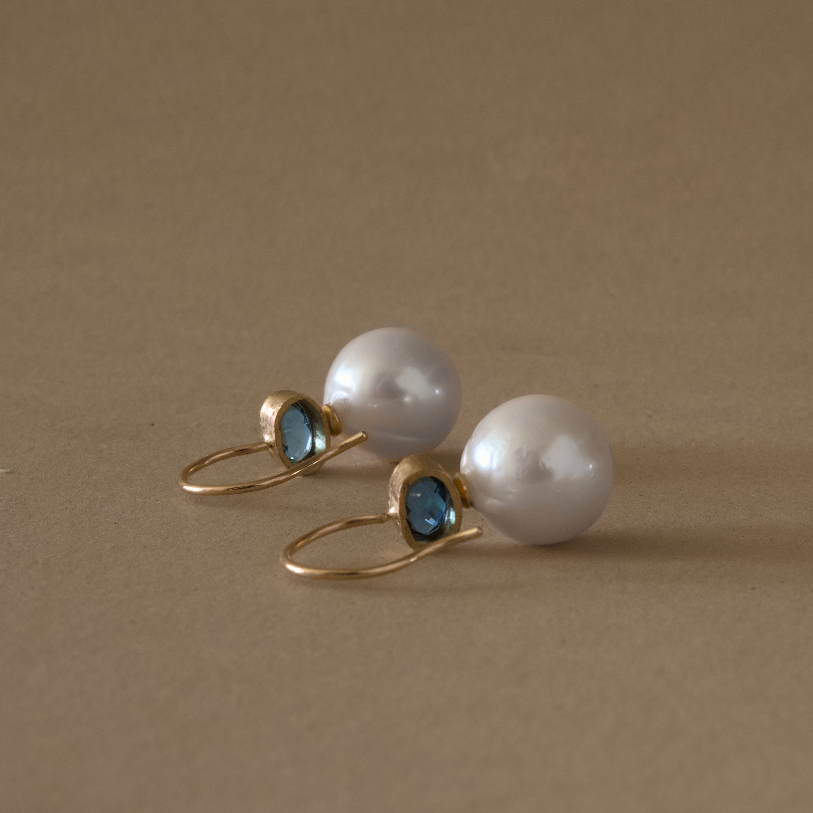  Blue Earrings with London blue topaz and freshwater pearls  in 14ct gold setting.