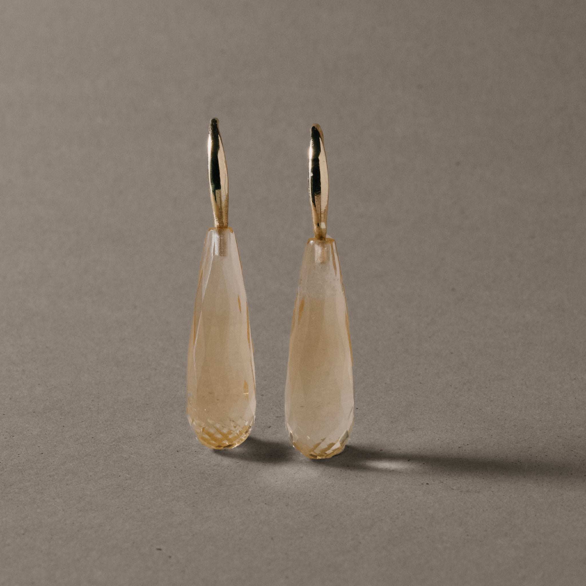 Elegant citrine earrings with gold hooks, November birthstone jewelry.