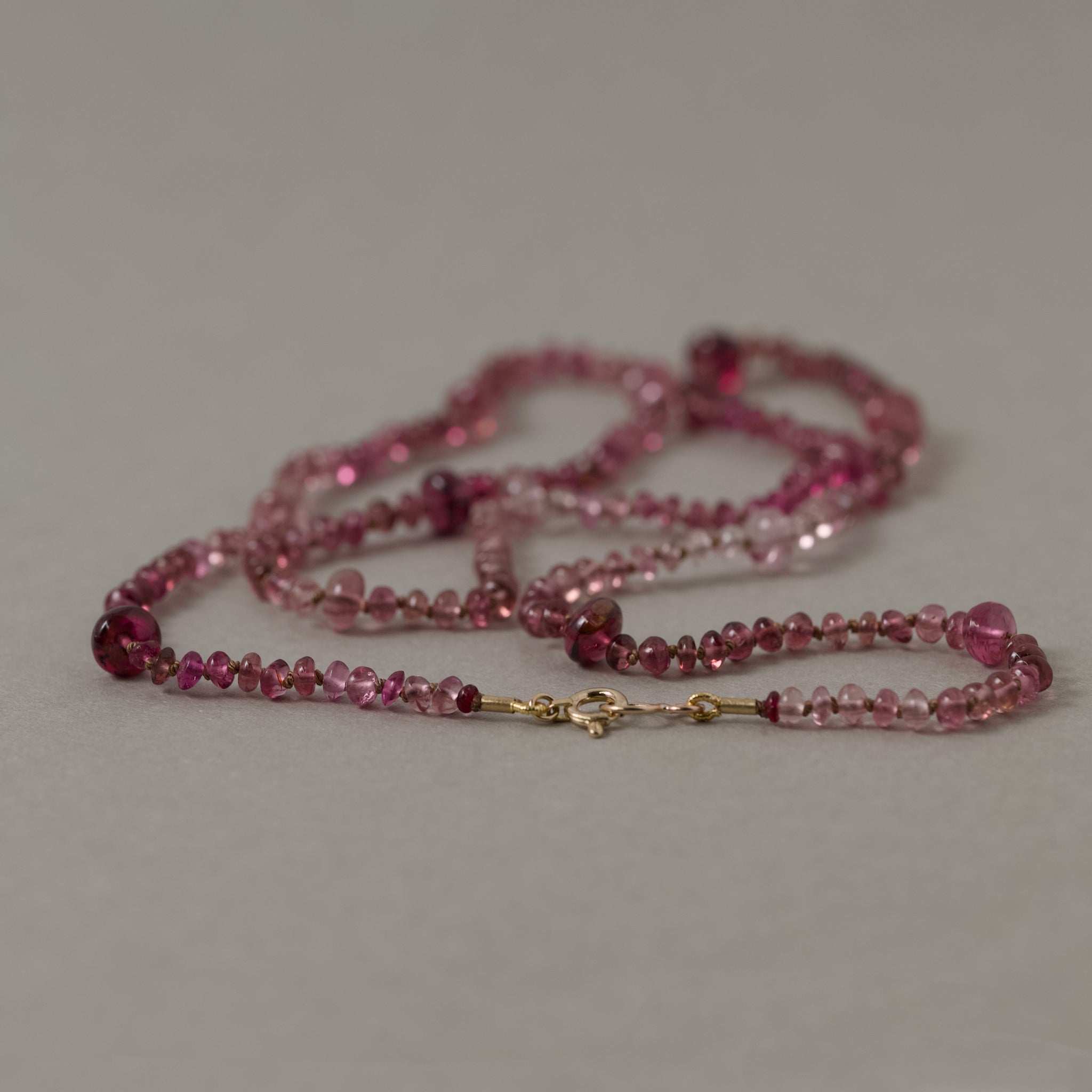 Filo Pink Tourmaline Necklace with rose tourmalines on pure silk and gold accents