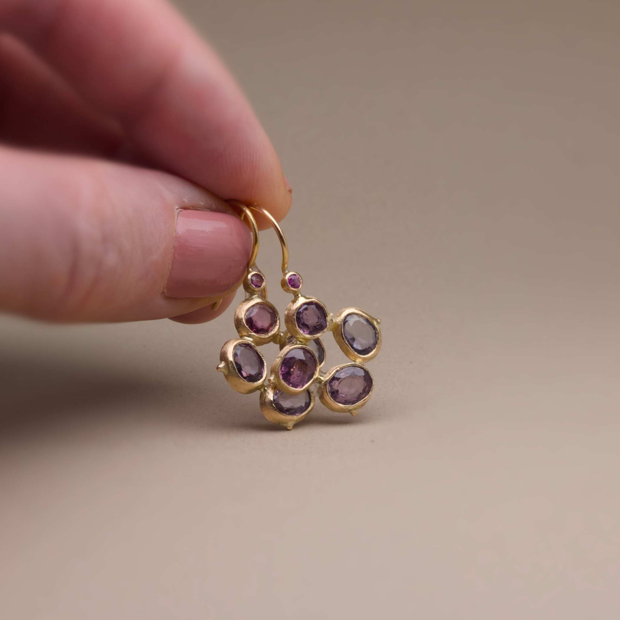 Handcrafted Flora Spinel Sapphire flower Earrings with plum and grey stones in gold.