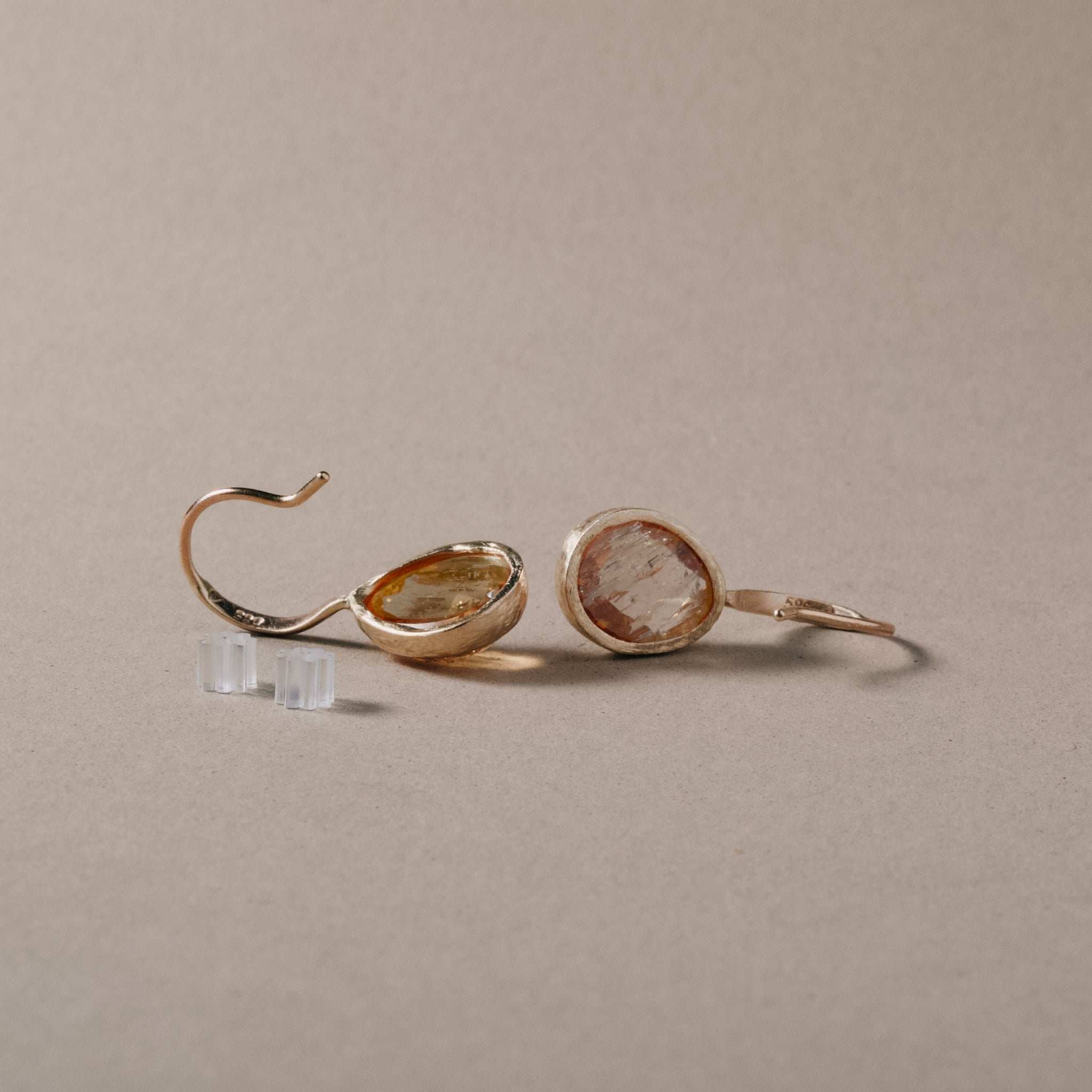 Handcrafted Pero Imperial Topaz Earrings in 14ct gold featuring peach and gold stones.