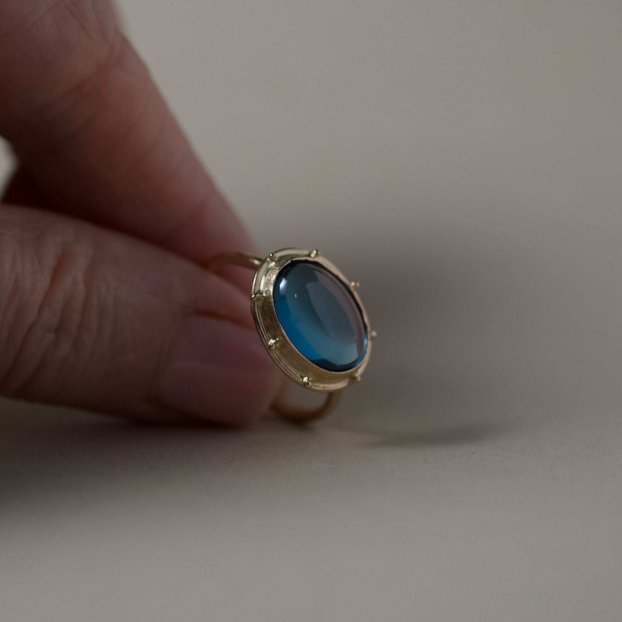 Large London Blue Topaz Ring in 14ct gold with 8ct cabochon stone.