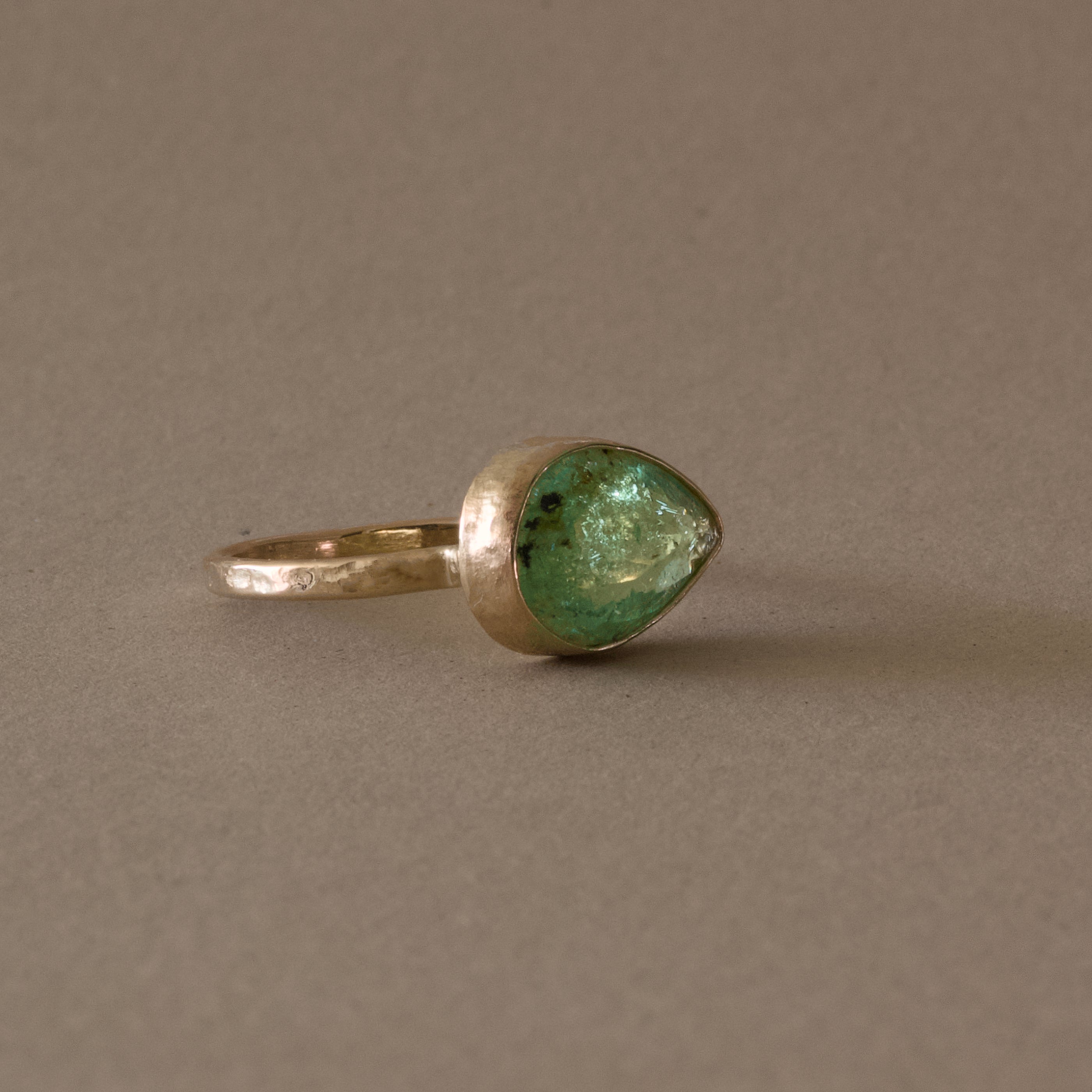 Pero Paraiba Tourmaline Ring with hammered gold band.