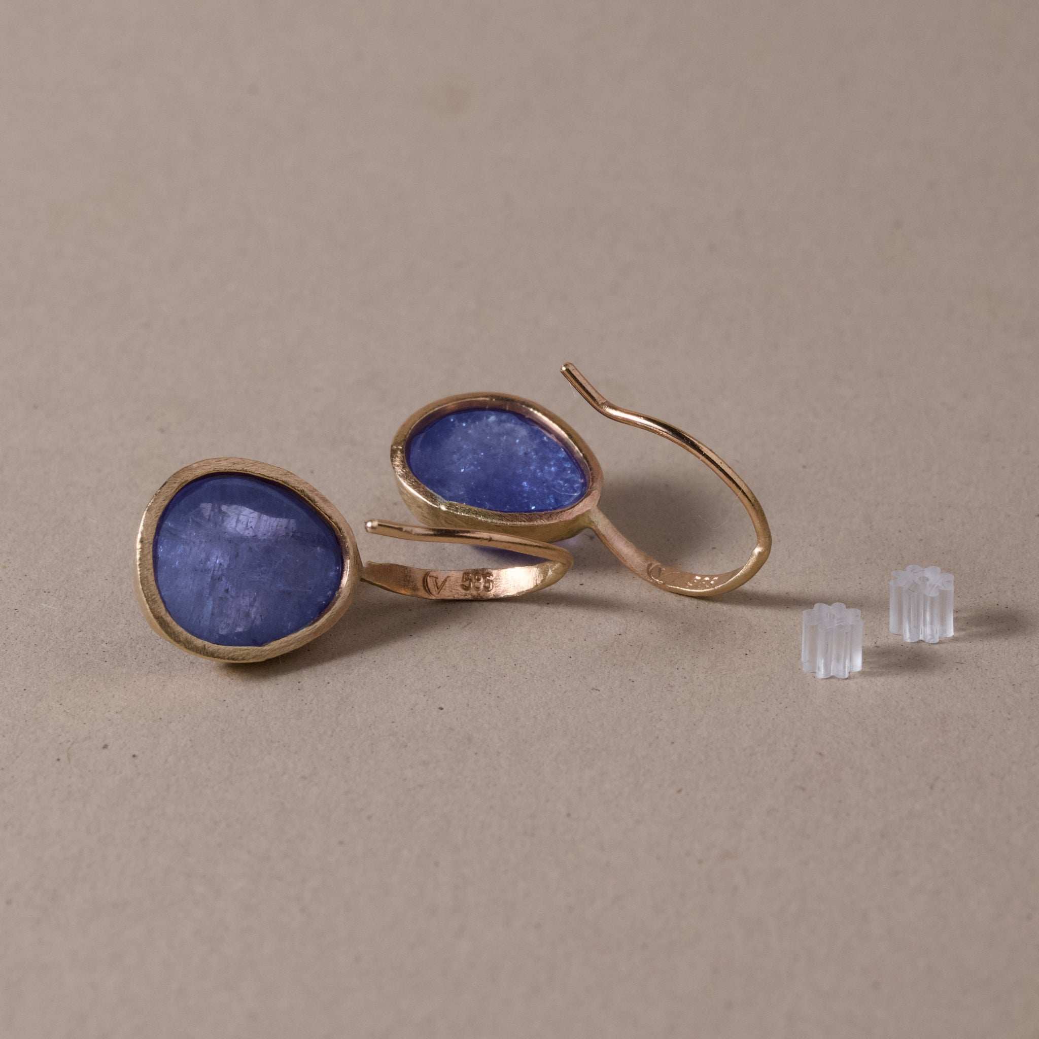 Handcrafted Tanzanite Earrings with Pear-Shaped Gemstones in 14ct Gold.