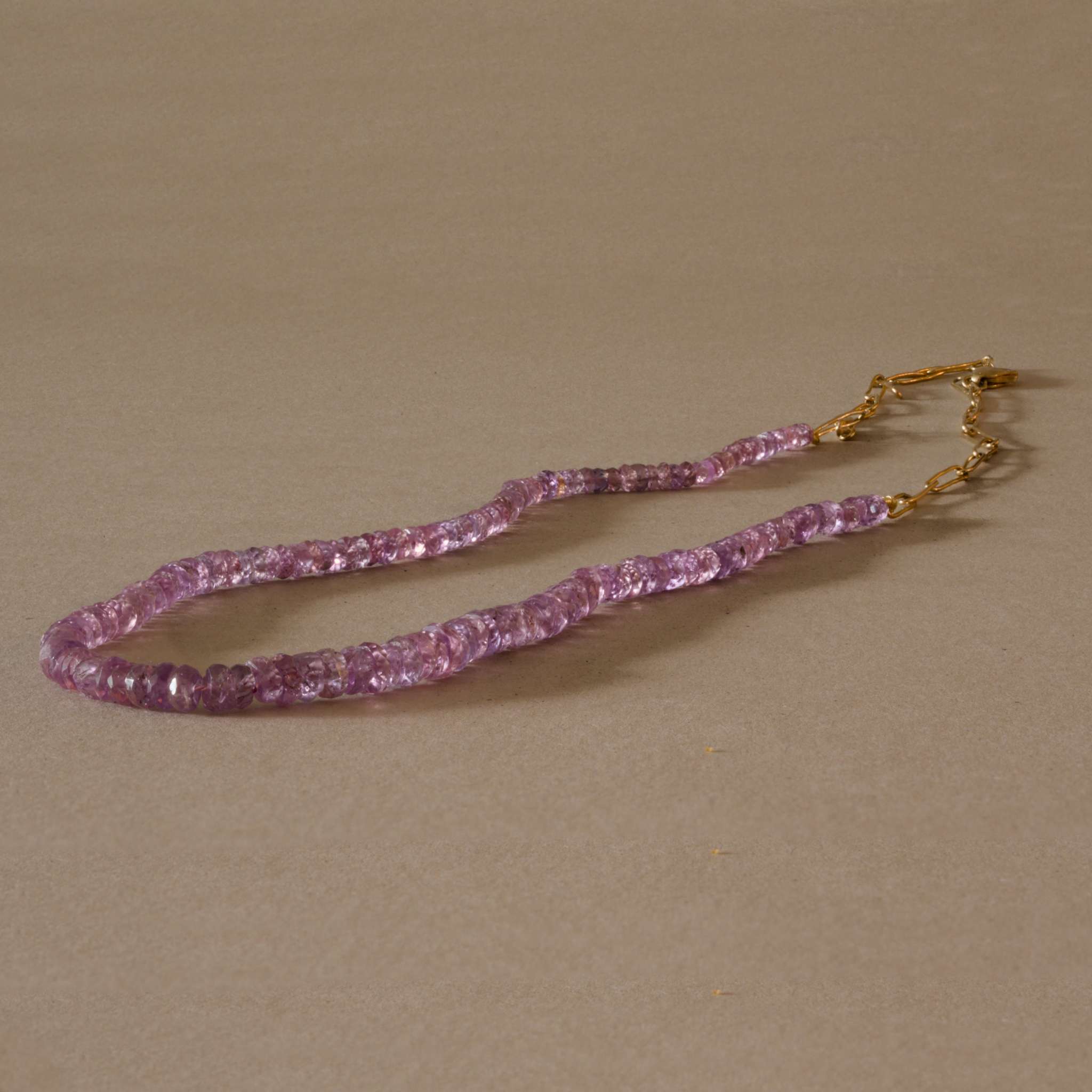 Filo Pink Sapphire Necklace with deep rose sapphires and 14ct gold chain.