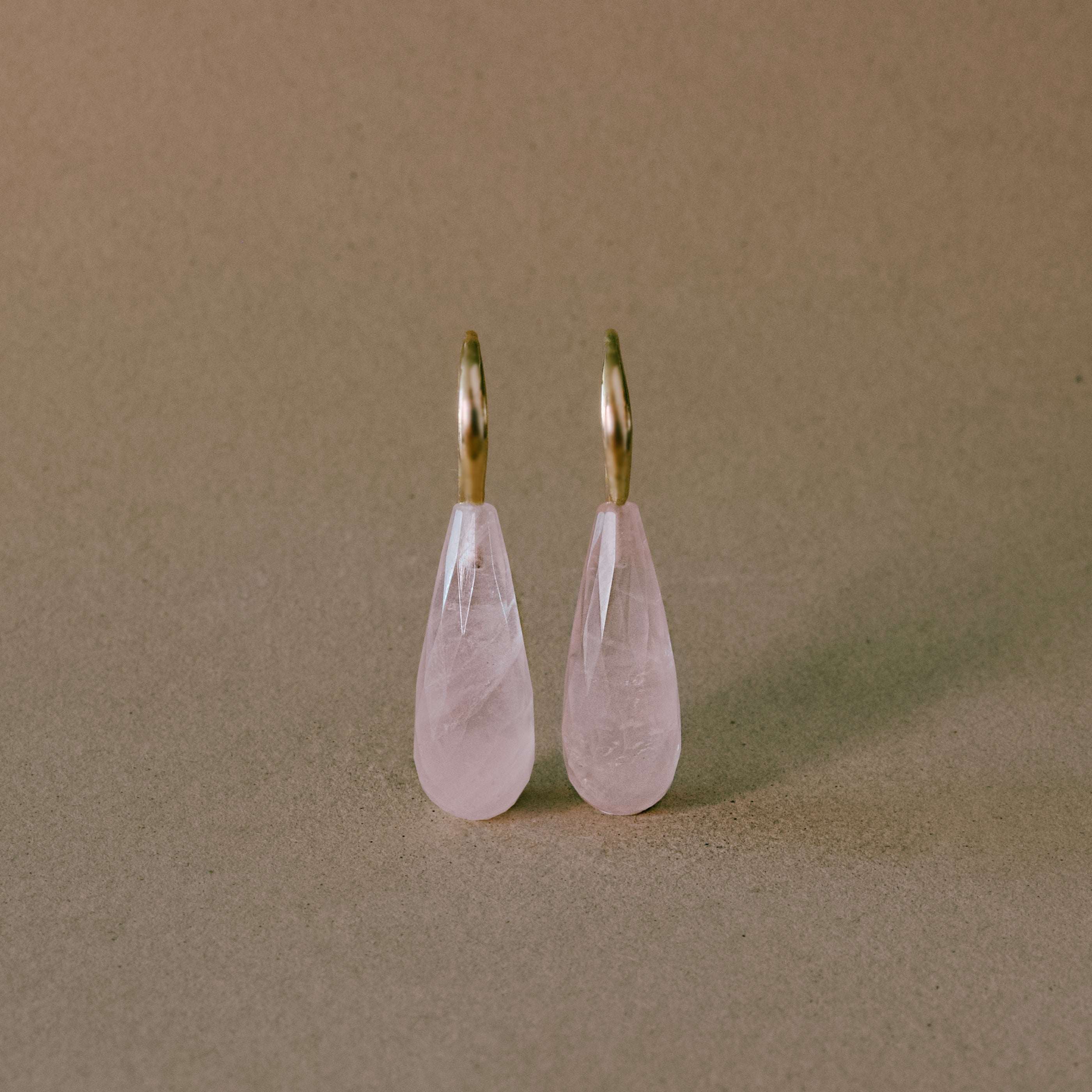 Rose Quartz Drop Earrings with 14ct gold hooks against a neutral background.