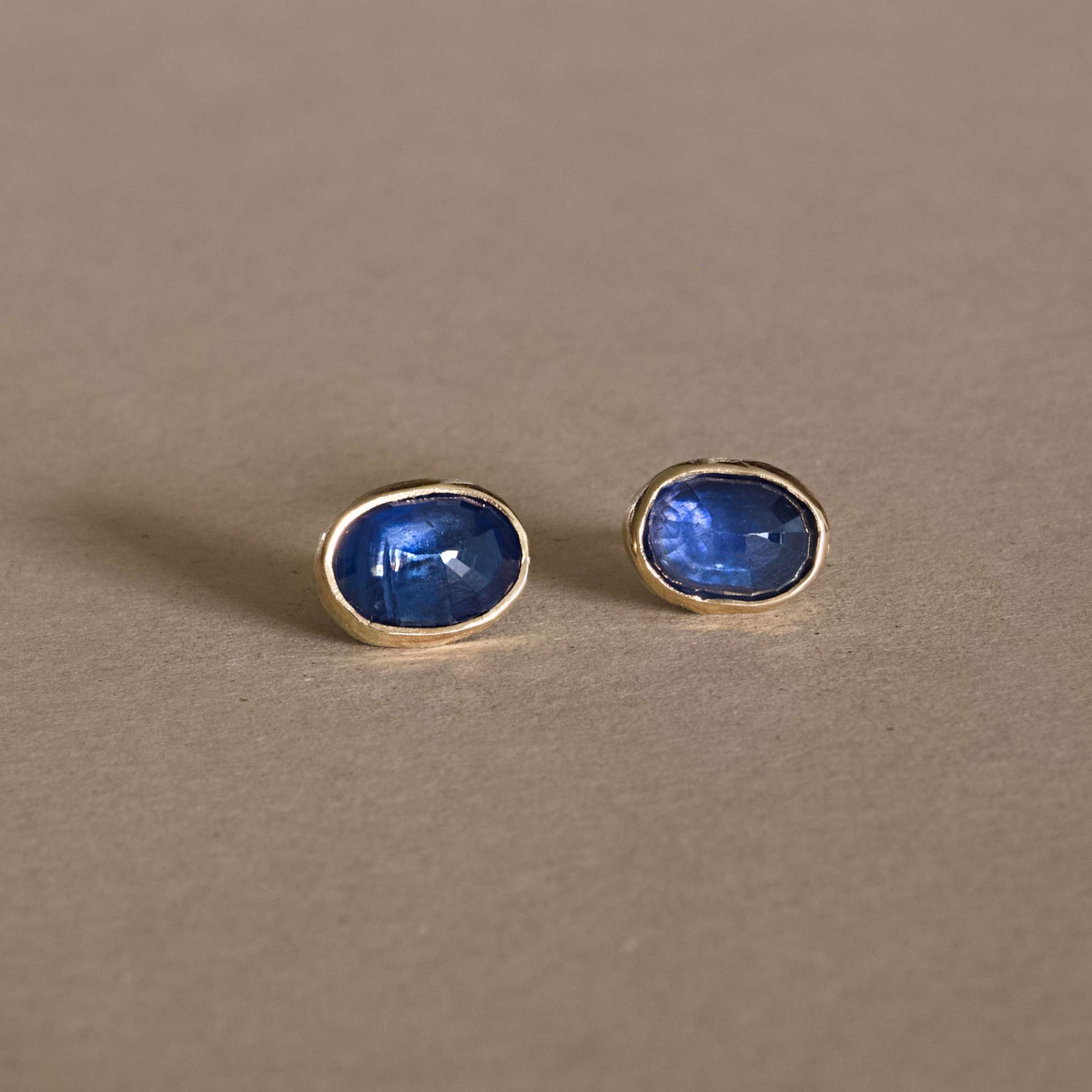 Handcrafted sapphire earrings set in gold.