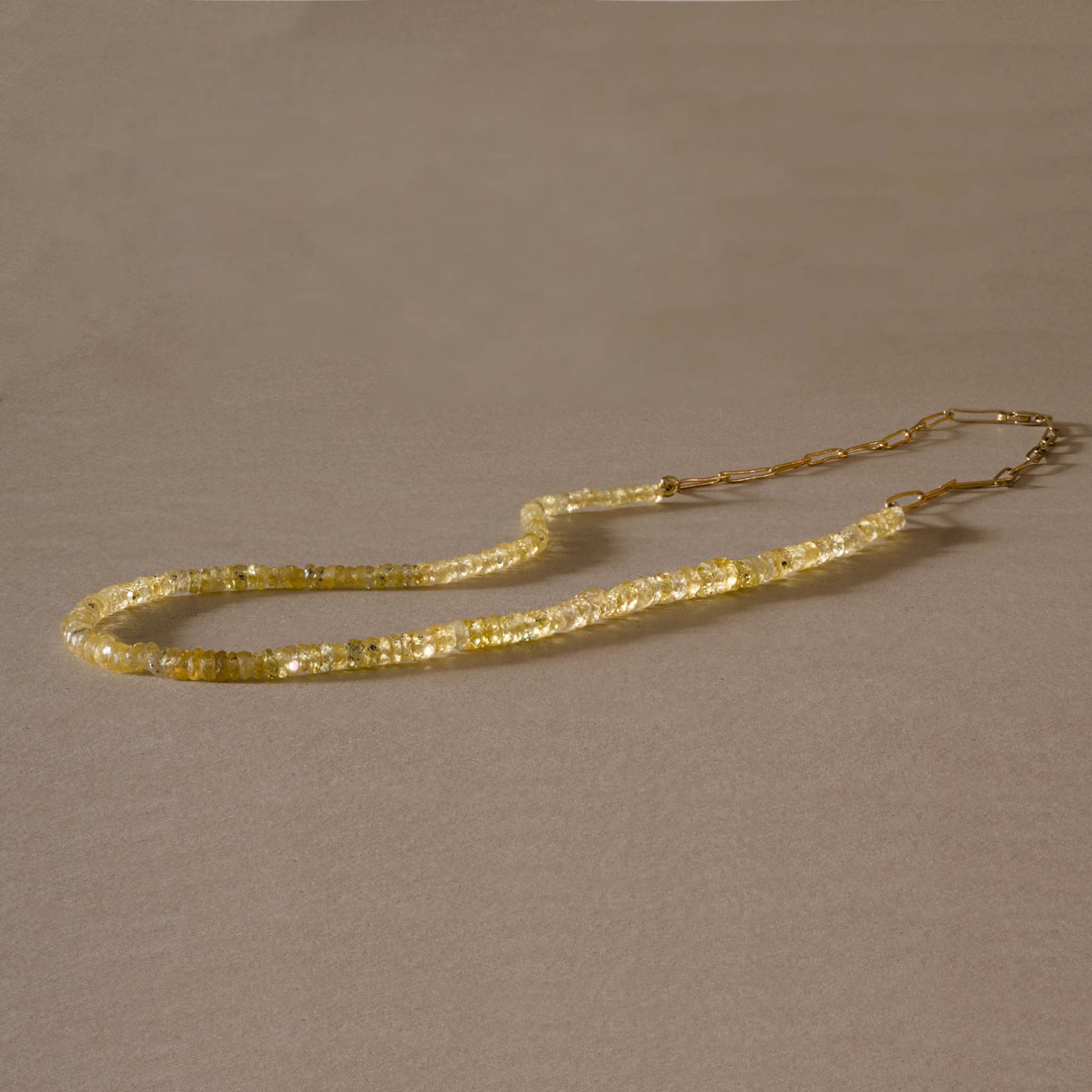 Filo Yellow Sapphire Necklace with faceted sapphire beads on a 14ct gold paperclip chain.